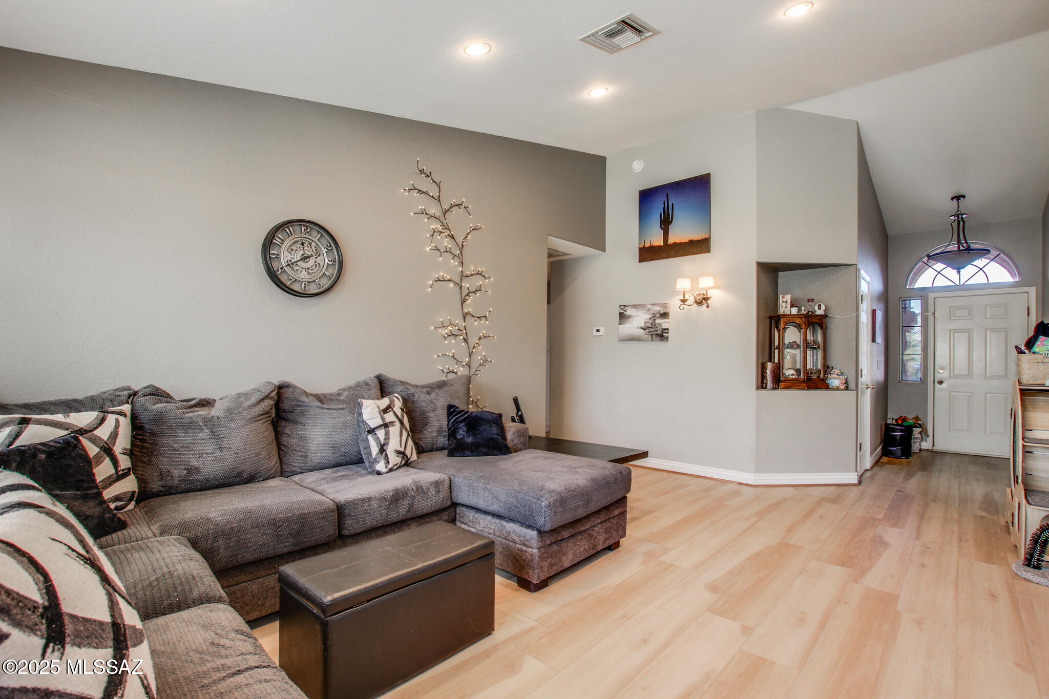 Beautiful contemporary home nestled in the desirable Saguaro Vistas neighborhood. The interior features vaulted ceilings, bay windows, and an open floor plan that enhances the sense of space and light. The kitchen is equipped with ample cabinetry and seamlessly connects to the living areas, making it perfect for daily living and entertaining. The primary suite boasts dual vanity sinks, a garden soaking tub, and a separate shower. The exterior offers a covered patio and a spacious turf area, with backdrop of mountain views.