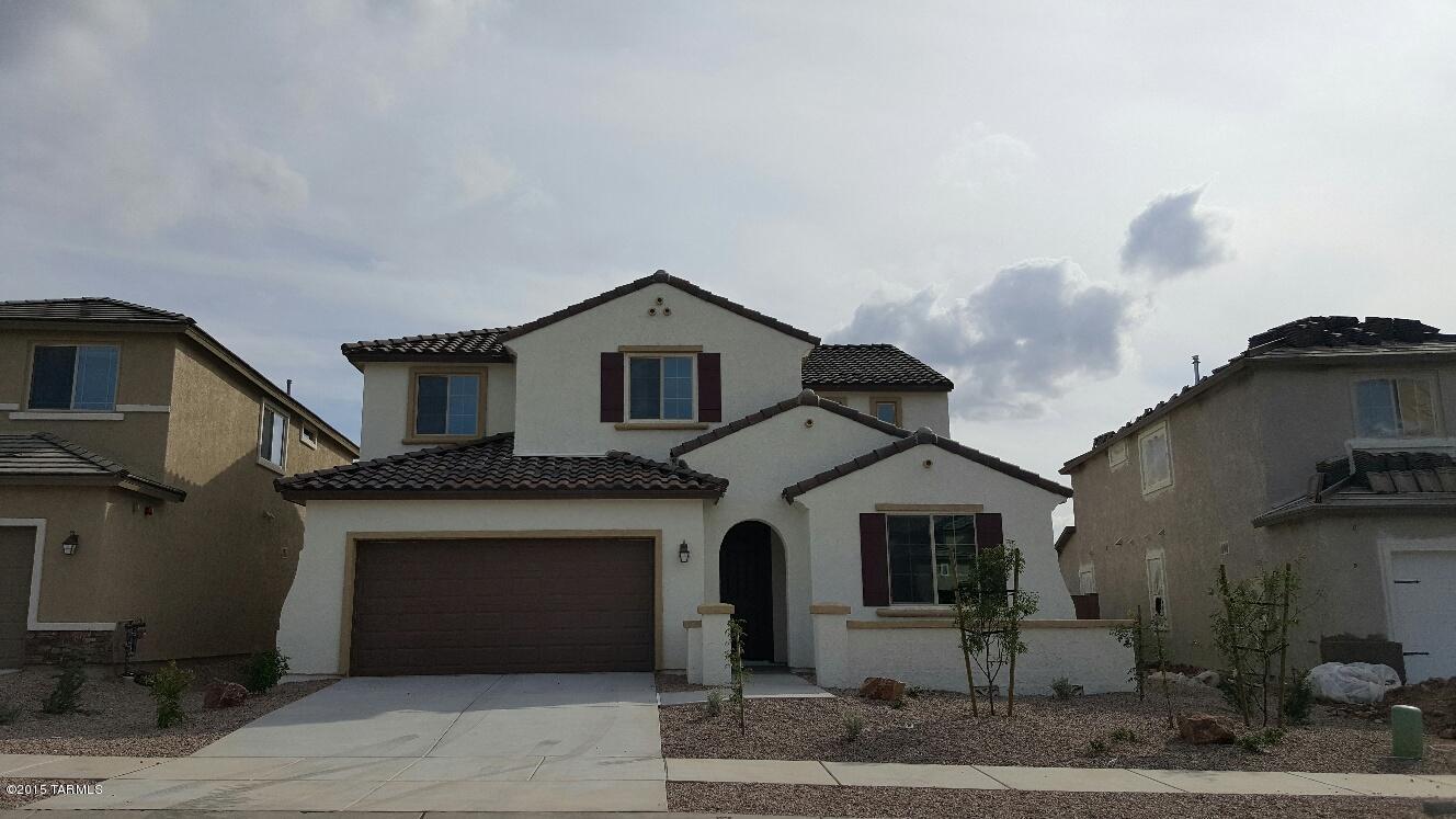 FABULOUS NEW HOME IN SOUGHT-AFTER SIERRA MORADO. YOUR NEW HOME FEATURES TRIPLE SLIDING GLASS DOOR AT THE GATHERING ROOM AND FRENCH DOORS OFF THE CAFÉ. MASTER HAS THE SOAKING TUB WITH A SEPARATE SHOWER. THE KITCHEN FEATURES TAHOE CHERRY CABINETRY AND VENETIAN GOLD SLAB GRANITE WITH LARGE KITCHEN ISLAND AND A PLANNING CENTER. THE REAR YARD IS VERY LARGE (APPROX. 58' X 65') WITH NATURAL DESERT AS A REAR NEIGHBOR. COMMUNITY CENTER AND POOL ROUND OUT THIS AMAZING OPPORTUNITY FOR A BRAND NEW HOME ON THE EAST SIDE. READY FOR MOVE-IN!