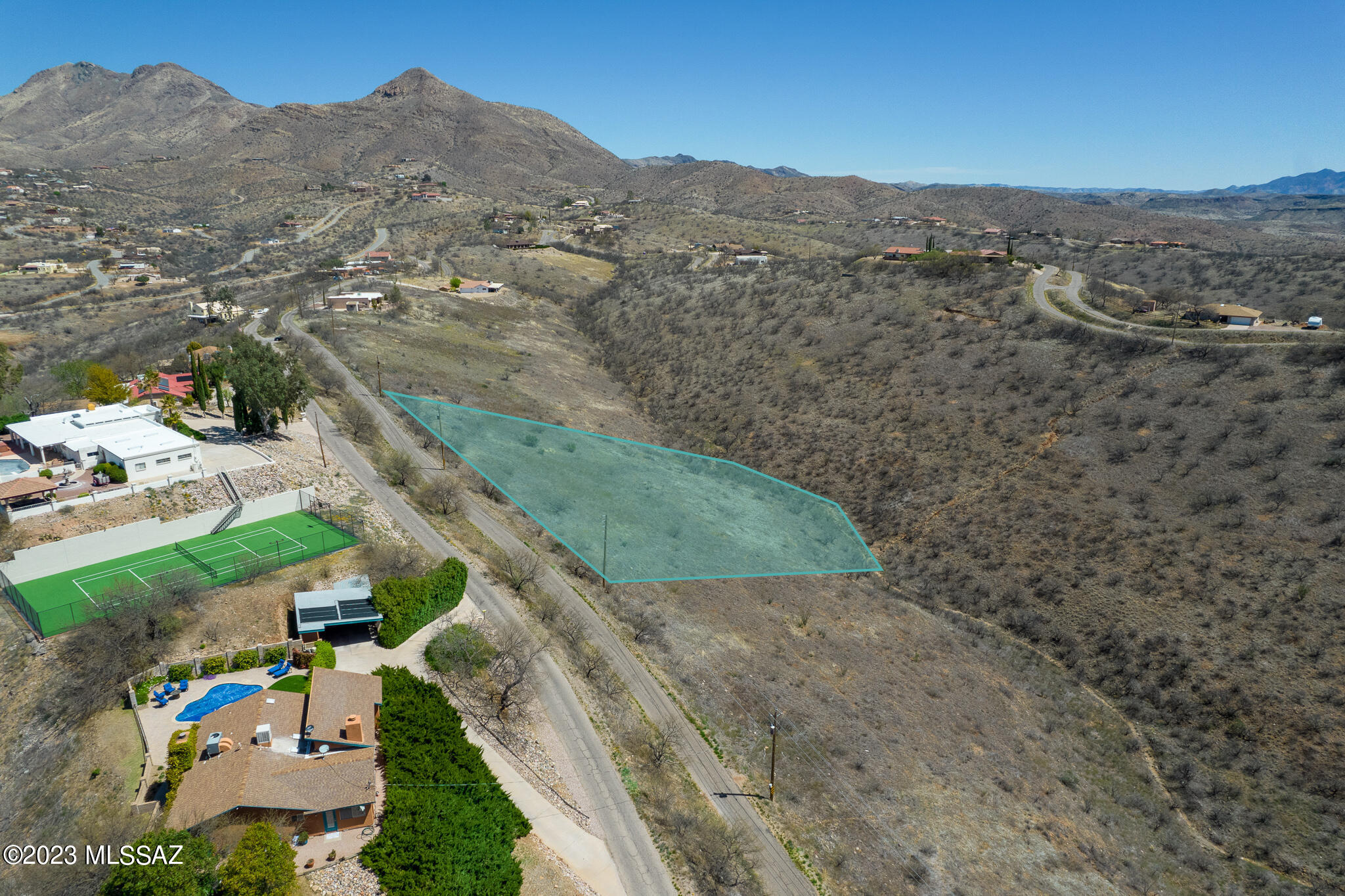 This property is just close enough and just far enough away!  Enjoy your 2+ acres located mere minutes away from Rio Rico amenities.  This residential lot is the candidate you've been looking for to host your new home!