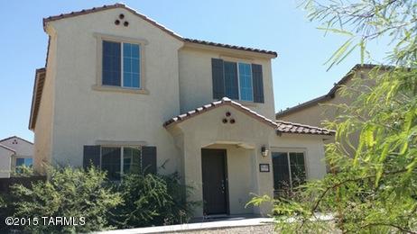 Terrace Model by Pulte! spacious floorplan with great room down and bedrooms up. this wonderful home, quiet and elegant, with great community amenities. Luxurious finished throughout. Private walled yard....Great views of the Rincons!