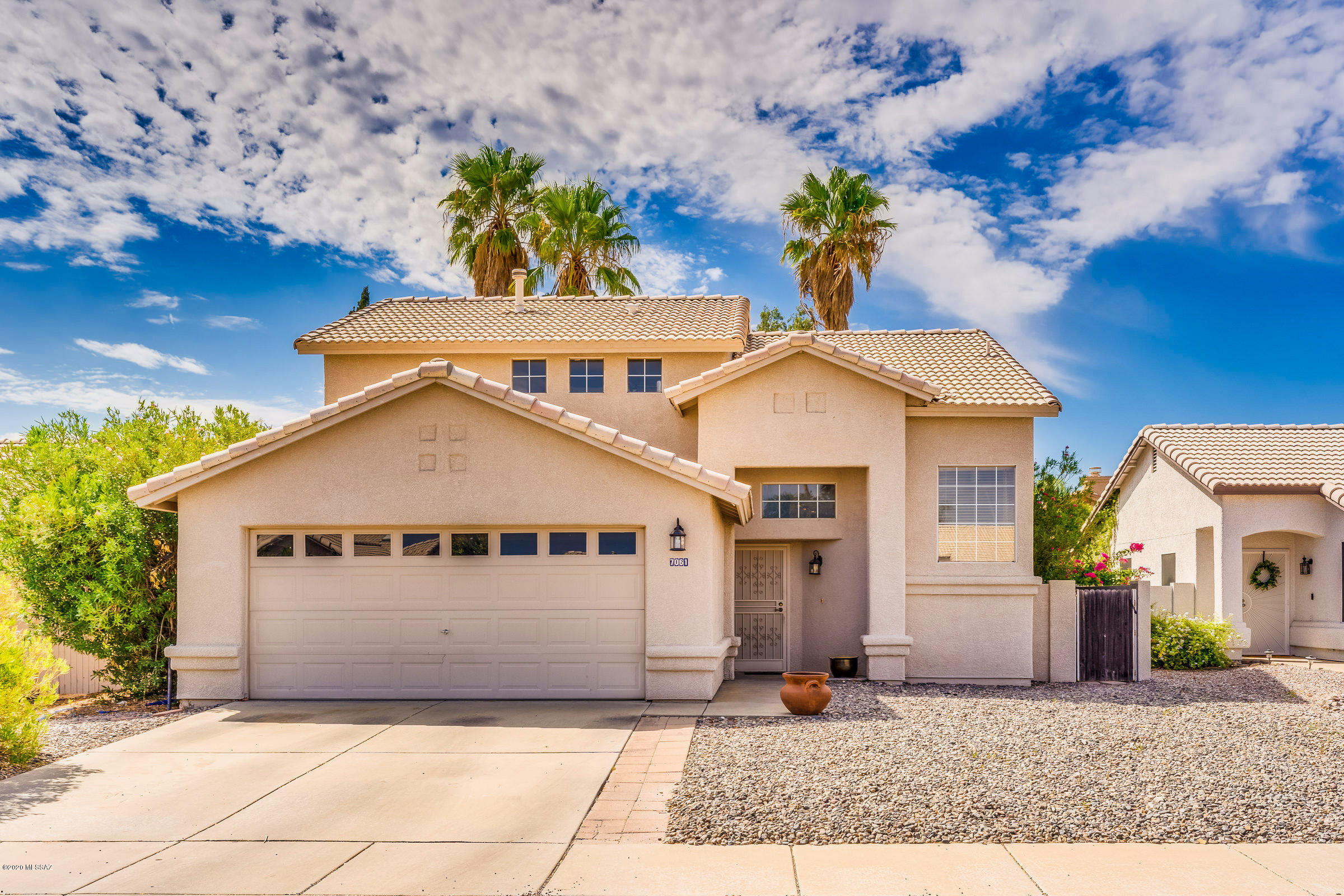 Enjoy Sombrero Peak views on your way to this perfect Continental Ranch home. 
Upon entrance you are welcomed with warm neutral colors, engineered plank flooring and a spacious great room.  Step into the cheerful kitchen boasting clean wood cabinetry, a gas range and stainless steel appliances.  Spend your summer days splashing in the pool or your winters relaxing in the spa.  This home is quietly tucked away in a beautiful neighborhood while being minutes from dining, shopping, entertainment, Marana schools, charter schools and I-10.  You're gonna love where you live!