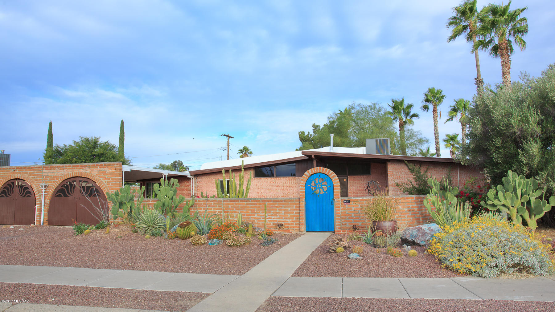 Great location! Near shopping, public transportation, Davis Monthan AFB, and anything else you might need. Freshly painted and move-in ready, this home is waiting for you! Tile floors and dual pane windows, plus new heating/cooling in 2013. Lovely, easy care outdoor spaces, including a beehive fireplace and mountain peek-a-views. Flowering plants attract butterflies and hummingbirds. Backyard has a separate area for your chickens, w/the coop already in place. Welcoming front courtyard, with low maintenance landscaping. Large family room w/gas fireplace makes it a great place to relax and enjoy a book or your favorite movie. Additional space adjacent to the family room can be utilized for crafting or an office.