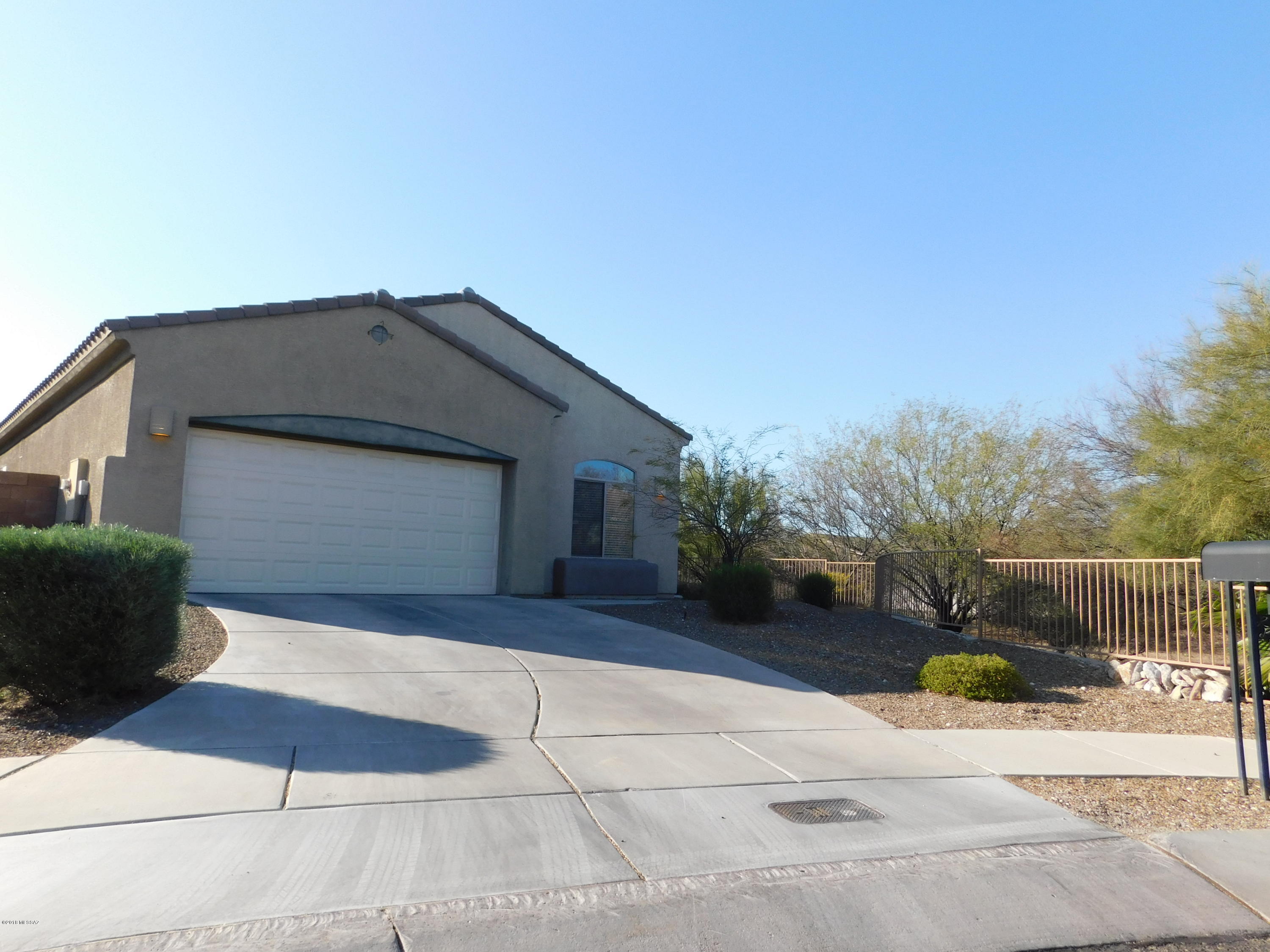 Lovely 3 BR, 2 BA, 3 car garage home on corner lot. Located in a great neighborhood with Stunning mountain views. This home has a spacious open split bedroom floor plan. Kitchen opens to great room that has a beautiful fireplace. Separate nook off great room could be used as an office or play room. Big laundry room with plenty of space for storage. The perfect place to call home!