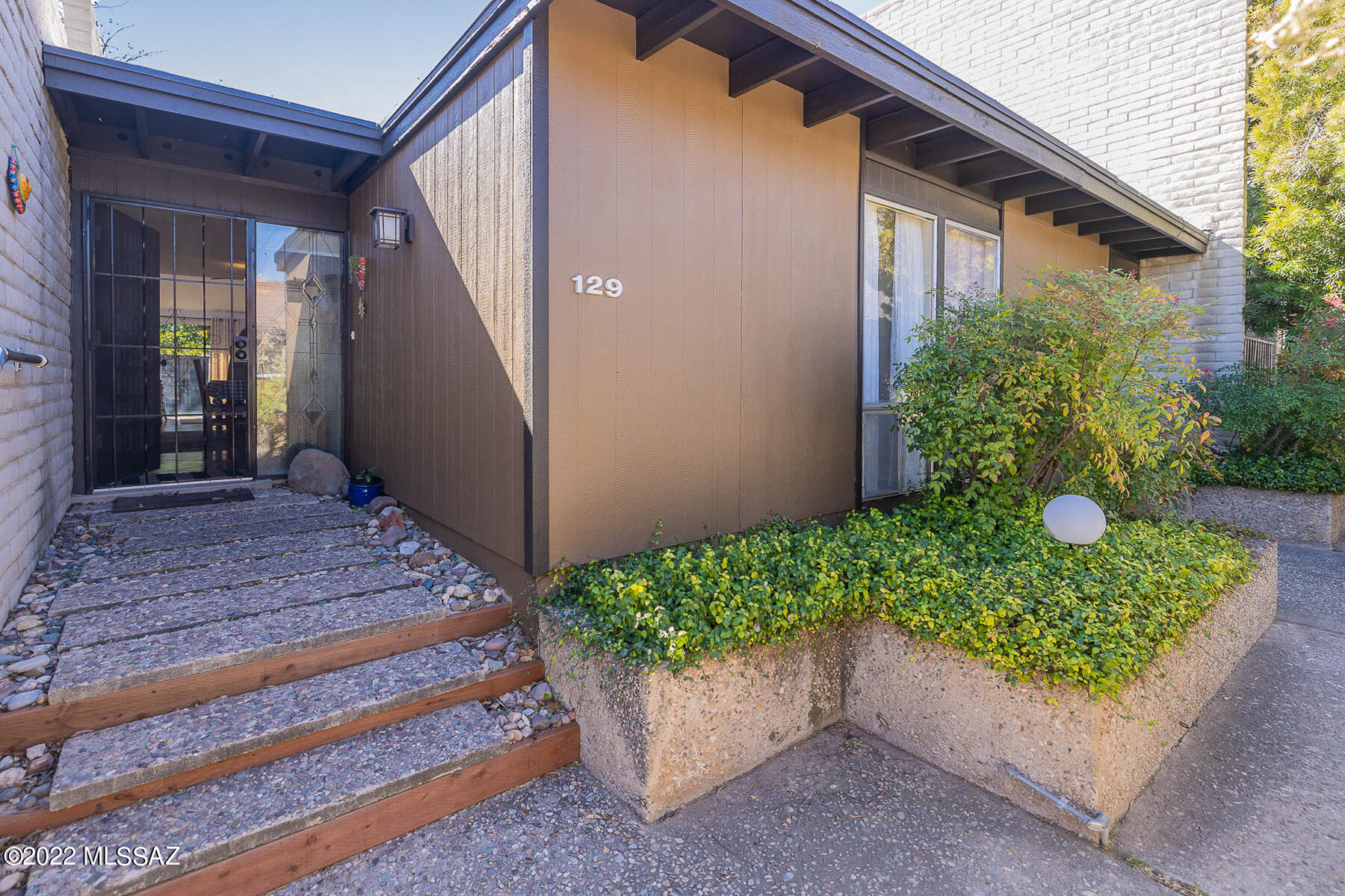 Charming, 2Br/2 Bath Townhome in high demand Orchard River neighborhood. Very well maintained w/ light & bright interior--newer HVAC, water heater, kitchen & bath sinks; new French Doors to private, rear yard w/ artificial turf. Relax by the community pool. Steps to the River Walk & bike trail & Ft. Lowell Park/tennis courts. Great location near Costco, Whole Foods, shops, restaurants, Tucson Medical Center. HOA covers the pool, common area maintenance, grounds, water/sewer, front yard, etc.