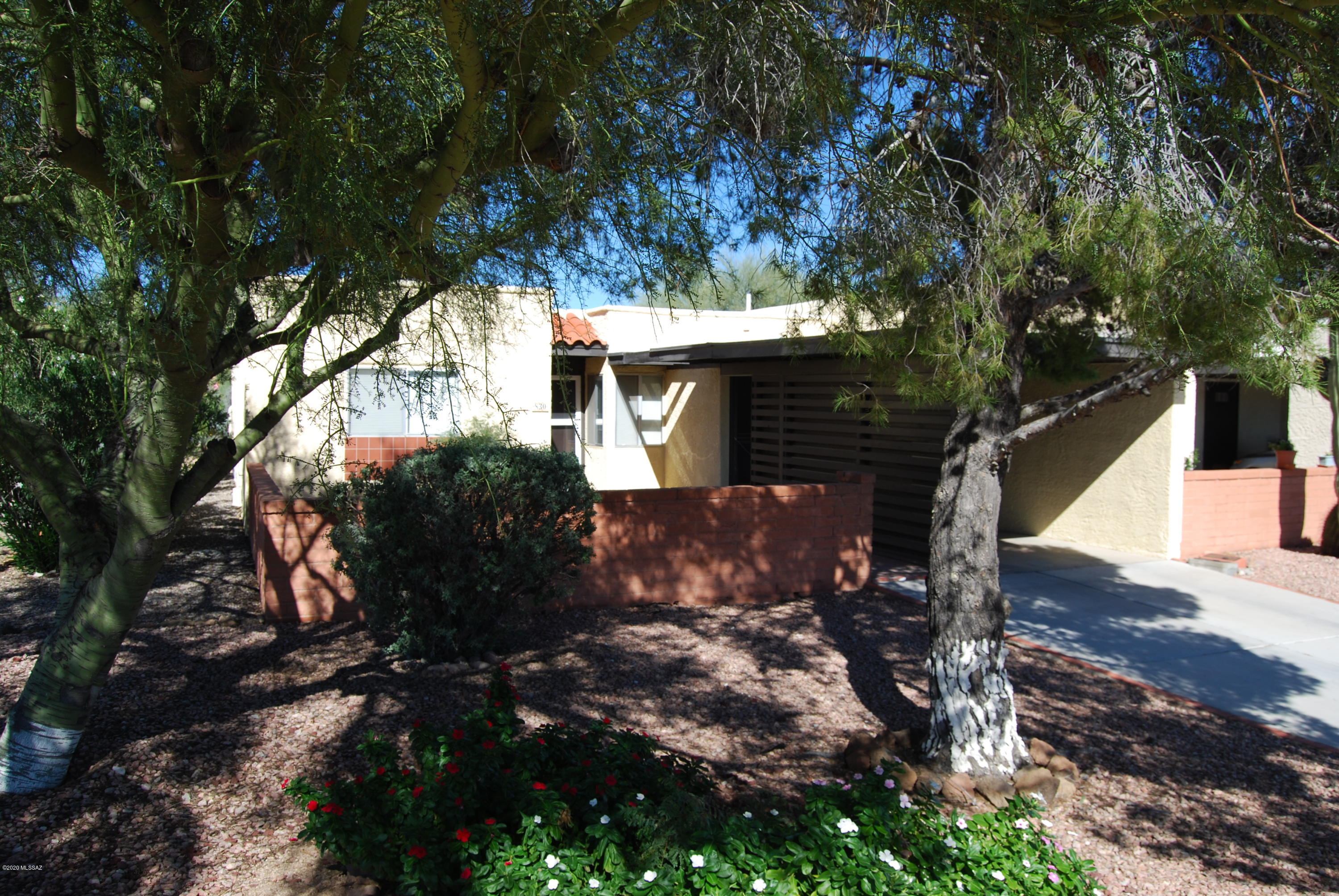 Enjoy peaceful living in the Colonia de los Alamos community in Green Valley, AZ.. Restricted to ages 55+, this well maintained 2-bedroom, 1-bathroom townhouse is an end unit with desert areas around the side and backyards. It has ceramic tile throughout, an updated kitchen & bathroom, ceiling fans, central AC, and an Arizona room that overlooks the backyard desert. Ready for immediate move-in and caring tenants to call their home.