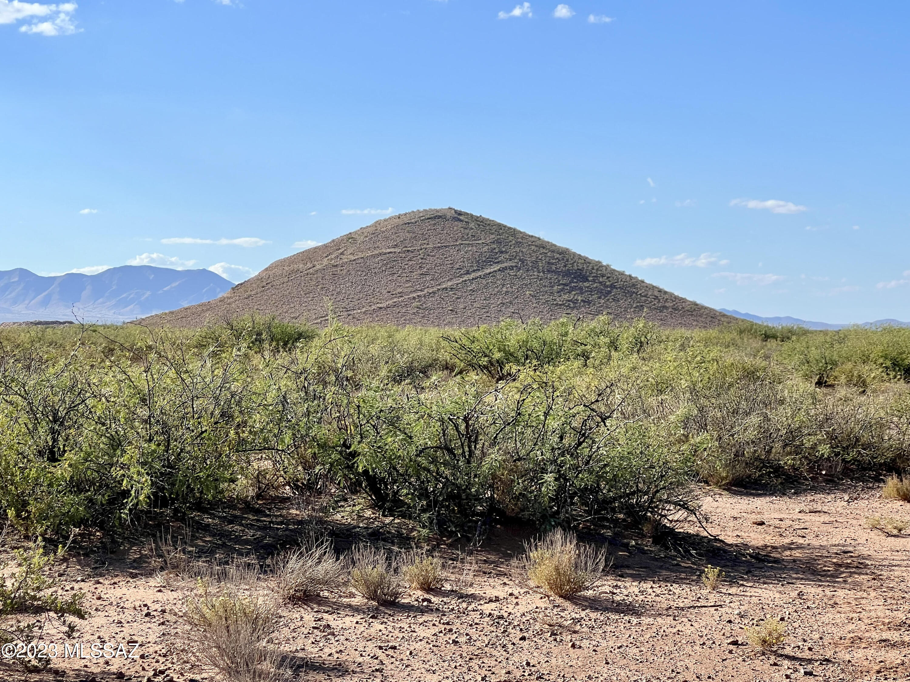 40 Acres of ranch land in Cochise County Arizona with Gorgeous sunsets and mountain views it would be hard to pass this one up! Fenced on one side. Neighboring rancher uses land per neighbor. If you do not want cows on the land you must fence it.