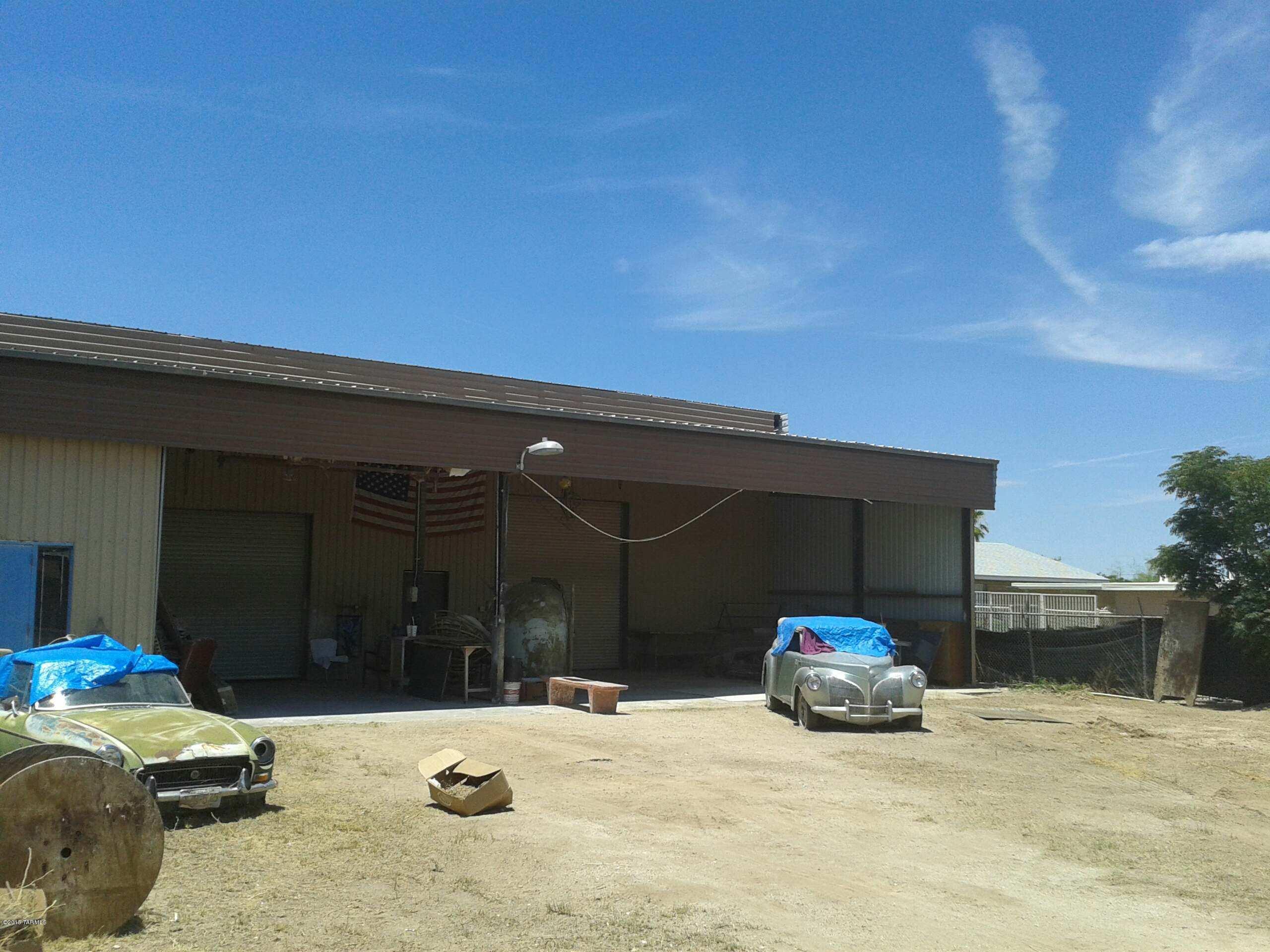 2970 sq. feet Metal Building with office and bathroom upstairs storage area good for new start up business possible paint booth building has air compressor needs some TLC