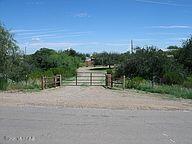 Really nice property and well cared for.  1.25 Acres of Horse Property with trees and fencing.  Present Owner added some nice improvements including a storage/workshop.  Lowest priced Single Family Home in Oracle on an acre or more.