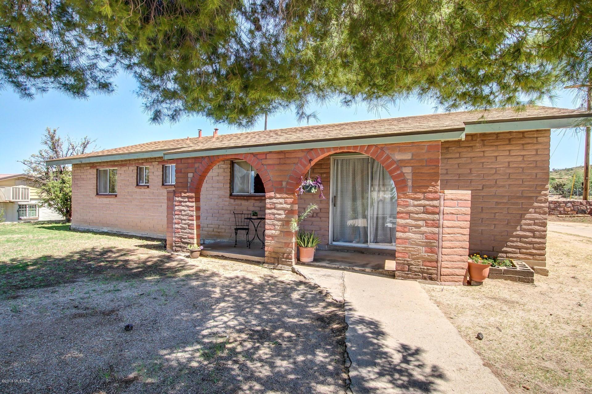 Welcome Home to the beautiful town of Oracle, AZ! Located just 20 miles NW of Tucson. This lovely 4 bedroom, 1.5 bath home with 2023 Sq ft is move-in ready! Brand new plush carpets and flooring, new roof in 2017 is still under warranty! Sellers just installed  brand new Stainless gas stove and Fridge! On the cooler winter evenings cozy up by one of the two wood burning fireplaces with beautiful stonework. Enjoy the small town feel and mountain views from your front door. No HOA's in this established neighborhood with lovely restaurants, art boutique shopping, and hiking trails to explore! Rural living at its finest, bring the family by and get ready to add your touches. New Furnace is being installed ! What a deal!