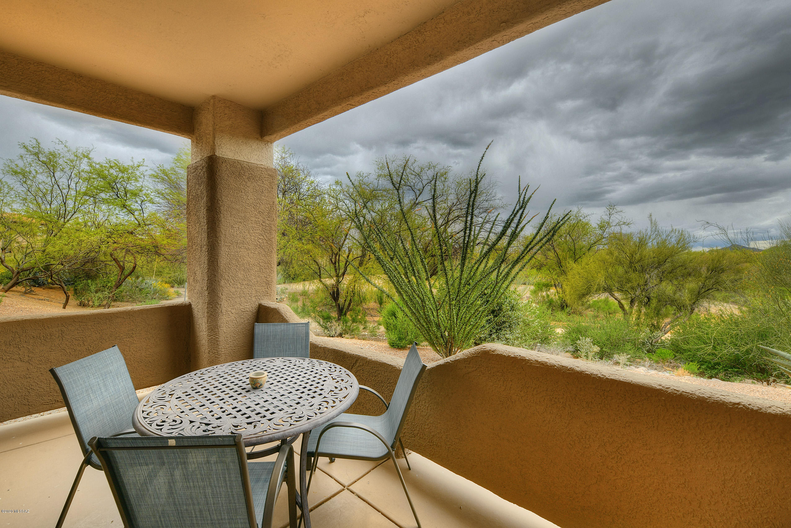 1st floor unit sold turn-key with all the furnishings and accessories. Covered patio to  enjoy a cup of coffee in the morning or a glass of wine to watch a gorgeous sunset! Enjoy leisure time golfing at the beautiful Views Golf Course only 5 minutes away or stay on site and lounge at the community pool and jacuzzi or use the clubhouse fitness room. HOA fees include basic cable, WIFI, water, sewer, garbage, building insurance, building exterior (yes painting and roof) maintenance and landscaping. Leave the worry behind and enjoy the comfort of condo living!
