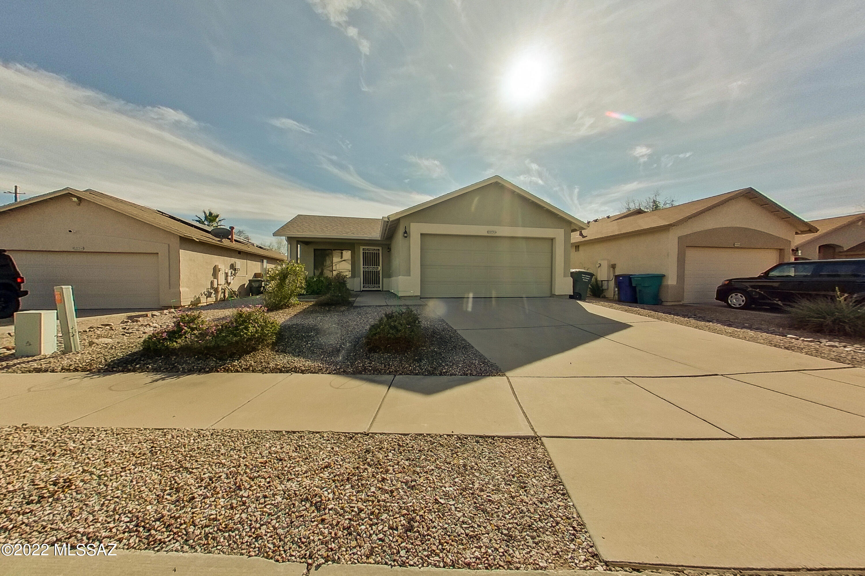 Vacant! Beautiful 3 bedroom, 2 bathroom 1 story home in Rita Ranch! This home has a large Arizona room perfect for those who like to grow lots of house plants! In addition this home features an outdoor grill, smoker, range, griddle and sink as well as a professional grade hood so you can BBQ all year long! No carpet and one bedroom has a built in desk for a home office. Kitchen features granite countertops, appliances and an island overlooking the great room. Nicely landscaped back and front yards with no neighbors behind. Great location close to shopping, dining and schools. Easy access to I-10 freeway.