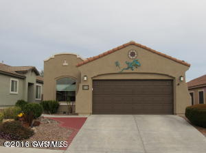 Absolutely gorgeous and completely remodeled 3 bedroom home in the desirable Del Webb Community. UPGRADES GALORE!! Wood flooring throughout, new stainless steel appliances, new bathroom showers and vanities, with new high end fans and fixtures. This beautiful house is being sold fully furnished with a full price offer. The 3rd bedroom is nicely appointed, with double doors and a plant shelf. The kitchen boasts Corian counter tops, upgraded staggered cabinets, with crown molding and brushed nickel pull handles. Backyard is completely landscaped and has an orange tree that produces in abundance. You're walking distance to the clubhouse and the community Wilderness Trail. SolarCity panels reduce your electric bill to only $48 a month! I promise you won't be disappointed with this amazing ho