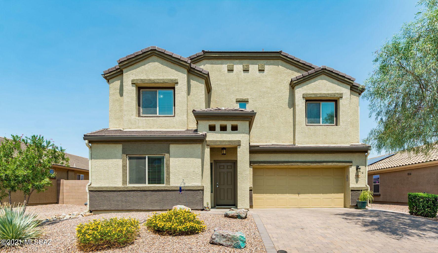 Don't wait 8 months to build in Saguaro Bloom when this beautifully updated 2015 property is available today! Kitchen & all baths have newly installed marble countertops (May 2021). Main floor is generous in size and flexibility; office, large great room, upgraded 1st floor full bath.Kitchen with SS appliances, cook's island, new sink/faucet and an oversized walk-in pantry complete the downstairs living. New lighting installed (May 2021) throughout the home. 4 beds 2 full updated baths are on the second floor. Also upstairs is a super loft; perfect for a movie viewing room, playroom, home office/school. Take your living outside in the backyard and enjoy a fire in the fire pit or entertain on the extended brick paver patios! Play equipment will stay or be removed per buyer's request.