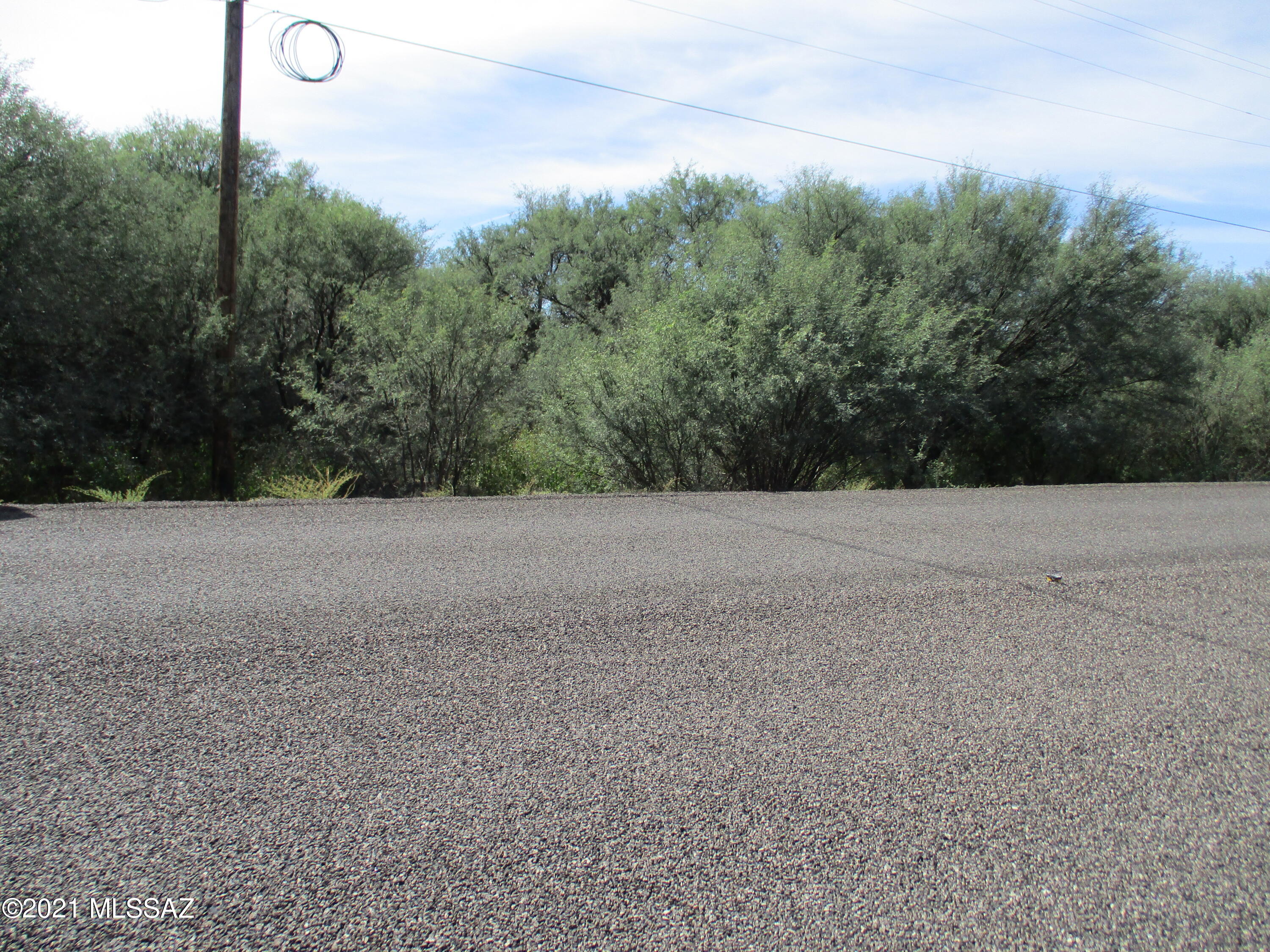 WOODED LOT ON THE OUTSKIRTS OF ST. DAVID. 3.18 ACRES WITH THE SAN PEDRO RIVER RUNNING THROUGH THE SOUTHERN MID-PORTION OF THE PROPERTY.GREAT PLACE TO BUILD A CABIN. ZONED R-18 MANUFACTURED HOMES ALLOWED.