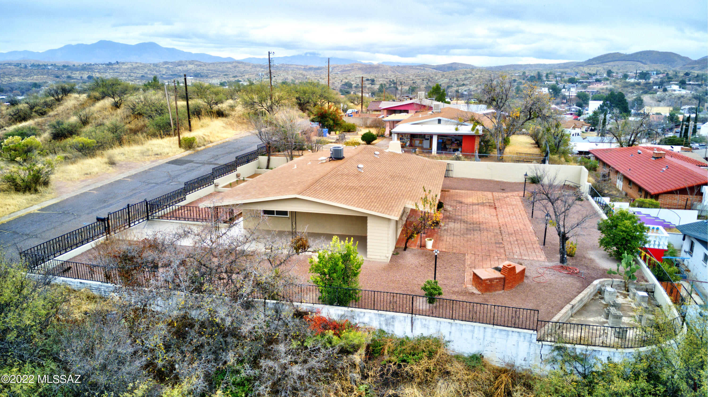 This home qualifies for the ZERO down payment program ask your lender for more information . Newly remodel with New roof new windows new Cabinets New floors .New AC Unit . With a great view to Nogales