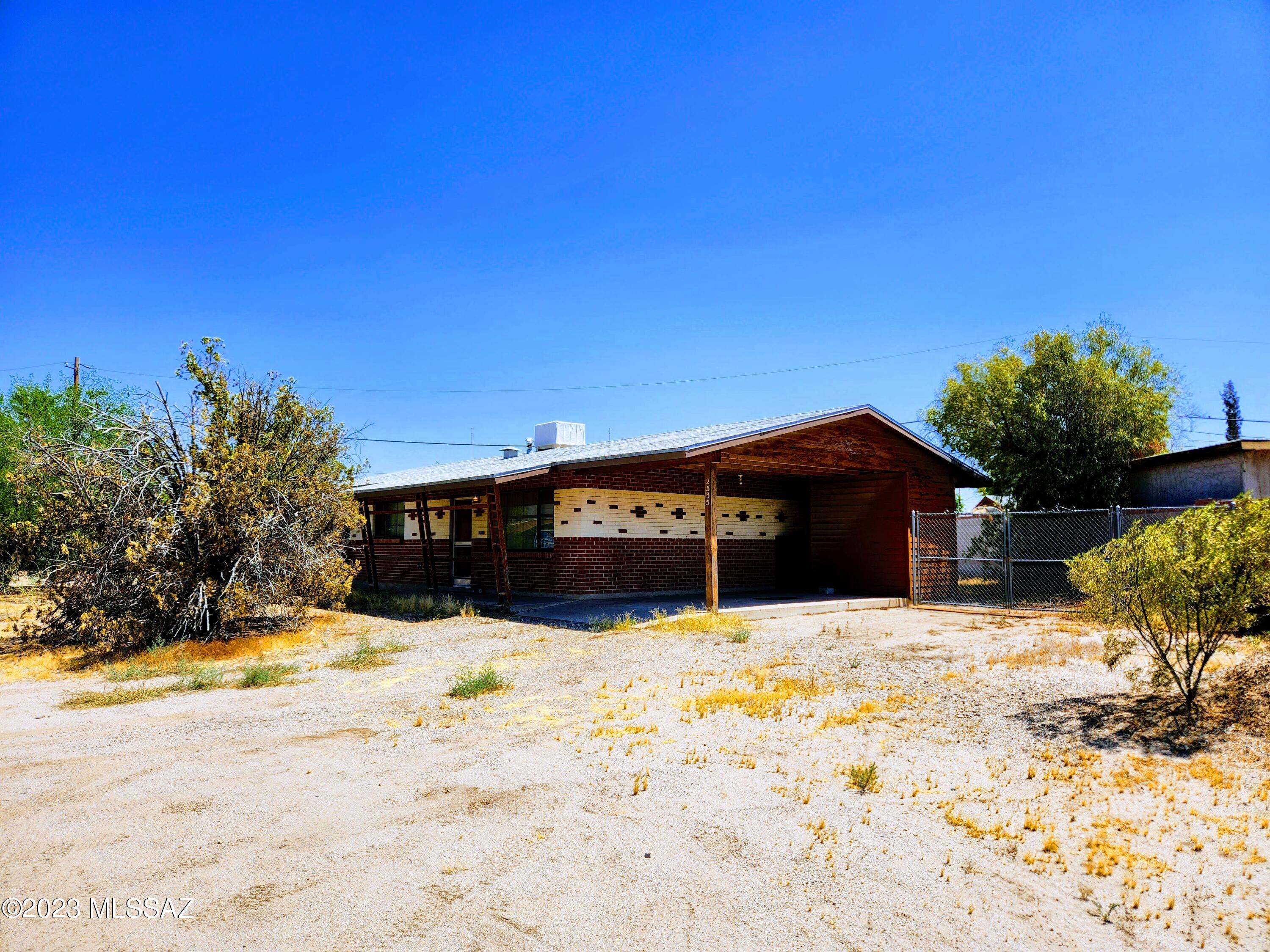 Excellent westside investment opportunity with convenient access to the I-10 and Downtown Tucson. Built in 1959, the home has 3 bedrooms and 1.5 bathrooms within 1041 square feet of space. The home is on a nice size lot and has tons of potential for local investors willing to put in the work that this great home deserves. The home is being sold in AS-Is condition. The Seller offers no warranties and will perform no repairs as part of this estate sale. Priced to sell and below market value. Come see the potential that awaits you.