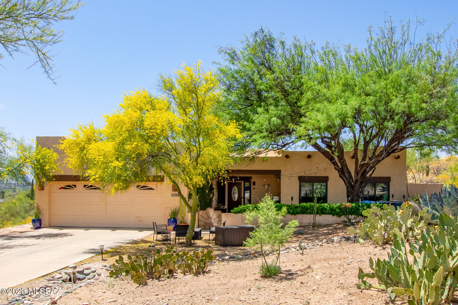 Come & check out this gorgeous 3 bedroom/2 bathroom home situated on a little over 1 acre lot with a pool & fantastic mountain views! This property truly has it all--plenty of space inside & out for living & entertaining, hard surface flooring throughout, beautiful desert landscaping, & a covered patio leading to your own little private backyard oasis. Close to shopping, restaurants, parks, & Mt. Lemmon. Schedule your showing TODAY!