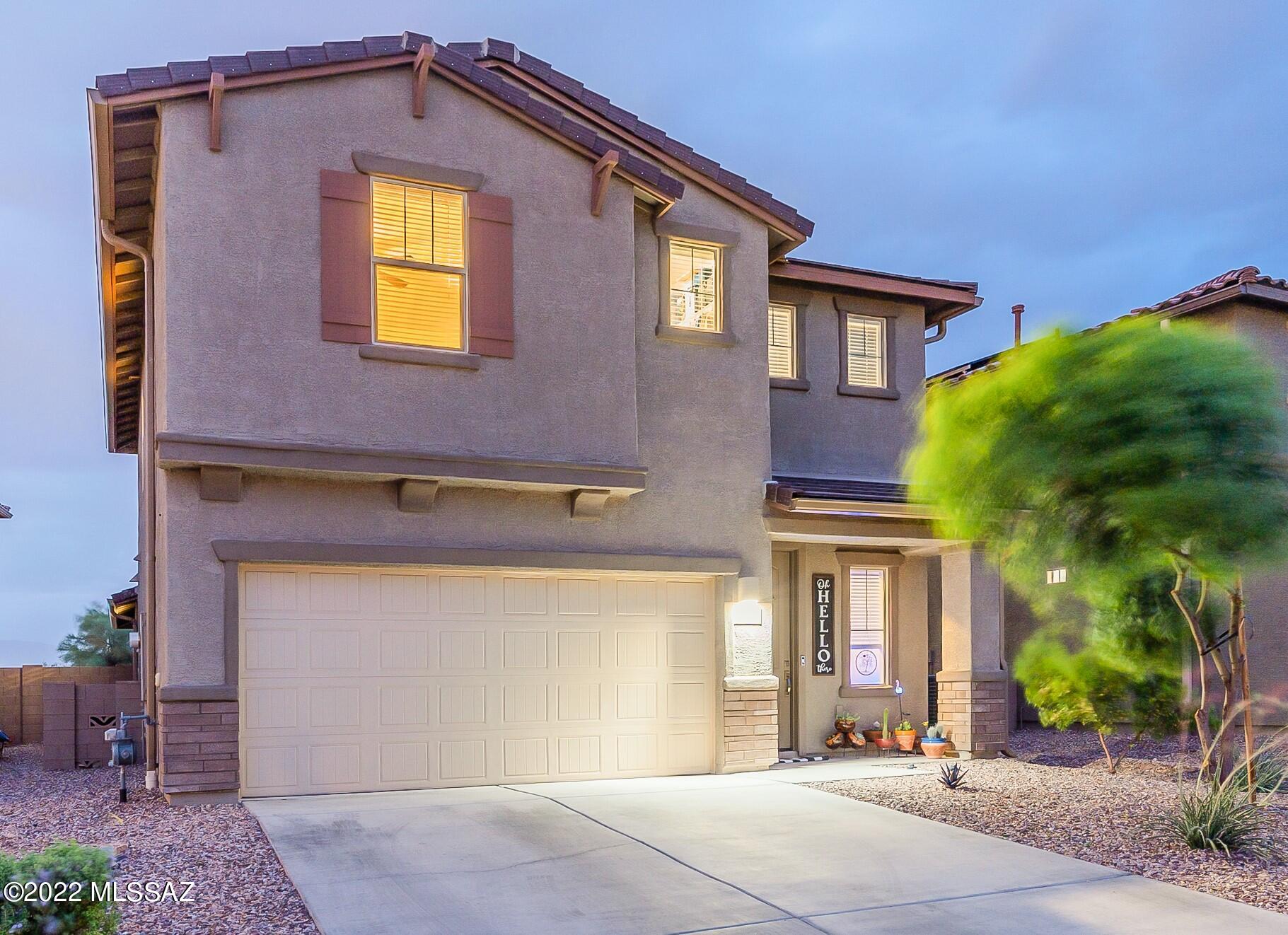 Better than new! This 2020 Meritage-built home has all the bells & whistles-just unpack your bags & enjoy panoramic mountain views & privacy w/open desert & popular Tucson Loop Path behind. La Estancia community convenient to DM, Amazon, I-10, Raytheon & features impressive amenities-park, playground, pool, & splash pad. 4 large bedrooms each w/walk-in closets + spacious loft, downstairs master suite. Too many upgrades to list. Stunning custom paint, fully landscaped w/brick paver patio, stylish lighting fixtures & fans, wood plank ceramic tile in all the right spaces, high-end carpet, dream kitchen w/SS appliances including fridge, huge island, quartz counters, subway tile backsplash, full-house UV purification filtration system. Highly acclaimed Vail Schools!