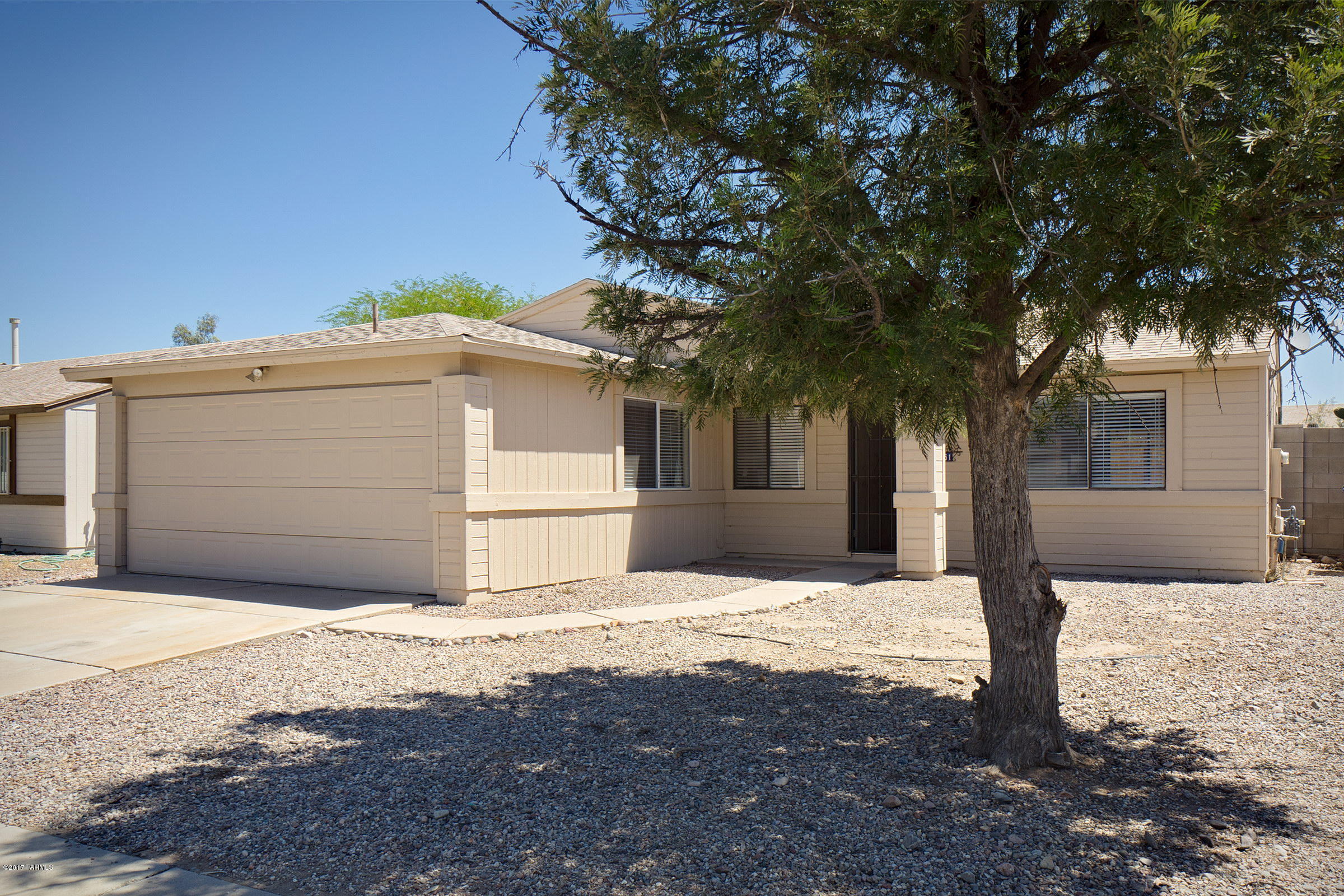 Clean and ready to go!! There are 3 bedrooms and 2 baths in this well laid out 1144 square feet. You will love the vaulted ceiling and the Satillo tile in the living spaces. Kitchen comes with all appliances including gas range. Master suite has private bath with walk in shower, and 2 guest bedrooms are serviced by a full bath. Outdoor space is fenced and offers a covered patio and low rise planter beds- has the bones- just needs your vision and a little work to make it an oasis. Ultra convenient location near lots of dining and shopping options including a Wal-Mart Super Center and several restaurants. This home will NOT last on the market (really- it is going to go QUICK) so don’t delay.