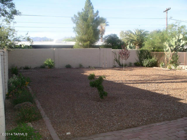 Gorgeous home with incredible upgrades including custom cabinets. Lovely Arizona room with a view of a sparkling private pool. This one is a must see.