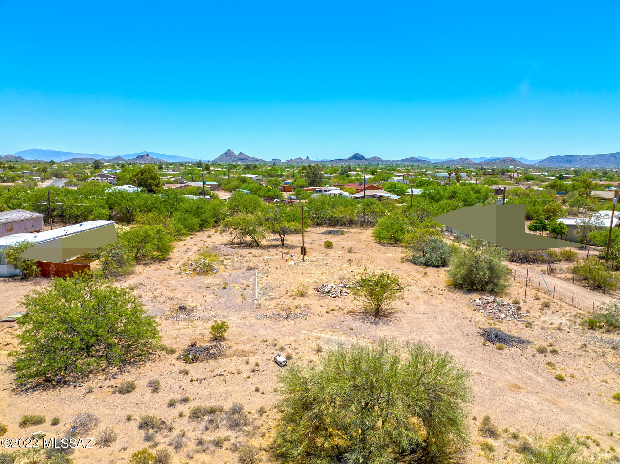 Spacious lot in Southwest Tucson! This vacant fenced land is cleared and ideal for your custom build and includes gas, water, electric, irrigation and septic on the property! All within minutes of recreational activities such as Old Tucson Desert Museum. Enjoy gorgeous scenic trials right in Gates Pass and only 19 minutes to downtown Tucson!