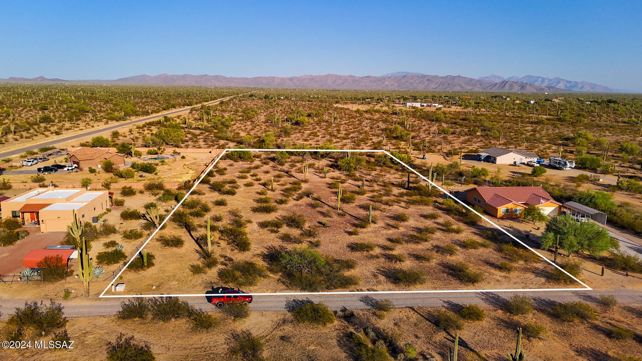 Hard to find Marana acreage with easy access to the I-10, with tall saguaros and mountain views every way you look. At 2.5 acres, you
have the room to do whatever you like, build, place a manufactured, have corrals, barns stables, guest house... or split the property and build on one parcel
and sell the other. Water and power are at the lot line and no HOA. Come see this gorgeous property for yourself.