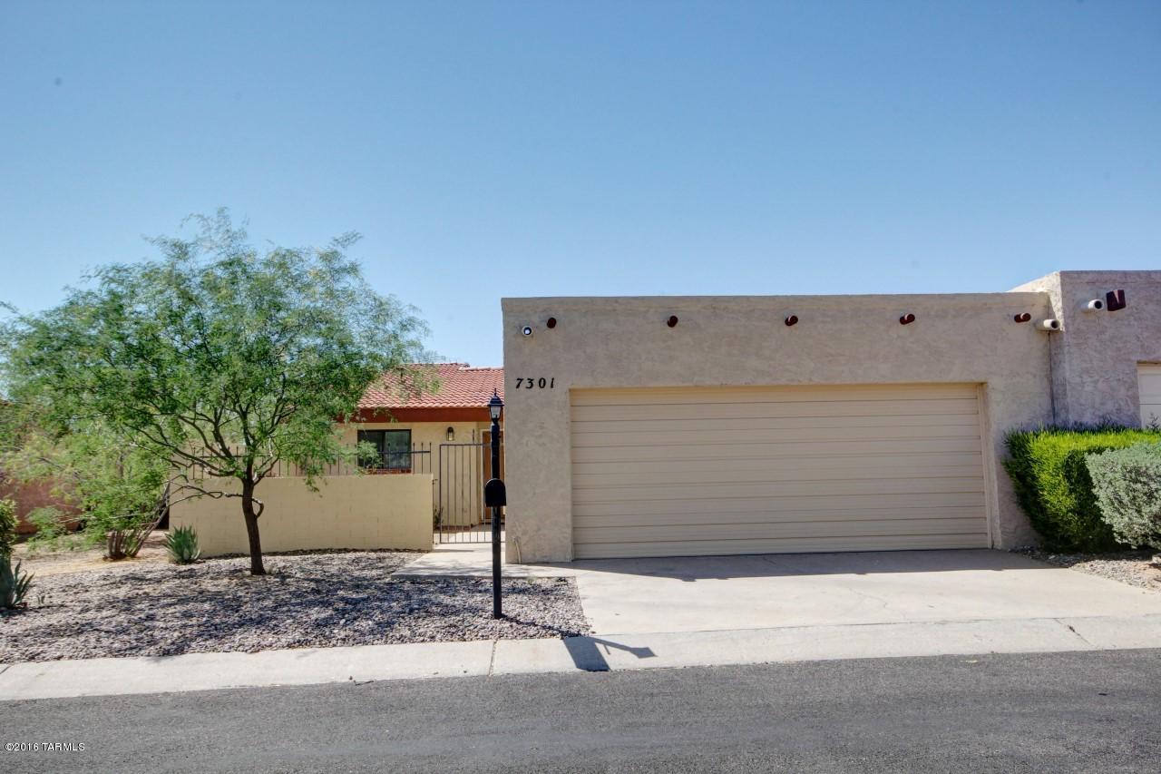 Amazing value in NW Tucson.  Beautiful 3bd/2bth home with vaulted ceilings, eat-in kitchen, formal dining area, attractive family room fireplace, covered rear patio with in ground Jacuzzi, and 2 car garage. Solid burnt adobe block construction with attractive and secure front courtyard. New roof and exterior paint. Conveniently close to the community pool & ramada area. Community offers wide streets, ample guest parking, and attractive landscaping. Located in a quiet and peaceful 57 unit townhome community. Conveniently located to shopping, restaurants, malls, parks, medical offices, transit services, and NW hospital. Home shows pride of ownership and is move in ready!