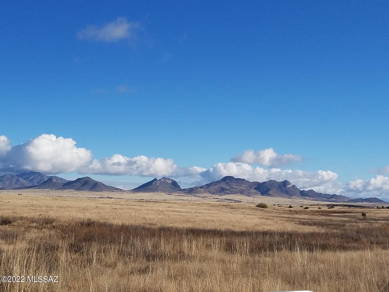 Nice flat usable land, could be split. Great views, Power is along West side of the property.