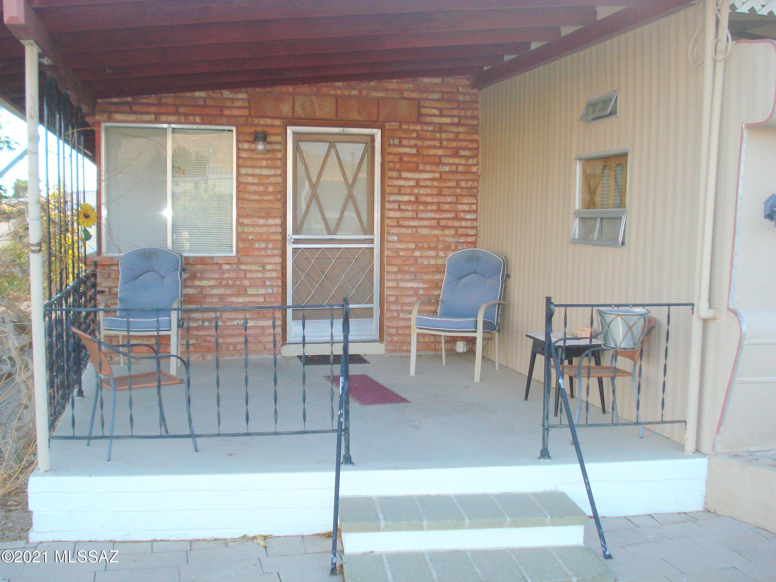 Tucson Estates ''55 Plus'' Community,
Perfect Winter Retreat or Year around home.  
Spacious brick addition included in the sq. ft., 2 BD, 1 1/2 BA.  Enjoy all the great amenities:  free golf, tennis & pickle ball courts, pools, spa, sauna, library, 2 rec. centers, exercise building & so much more.
You own the land!!