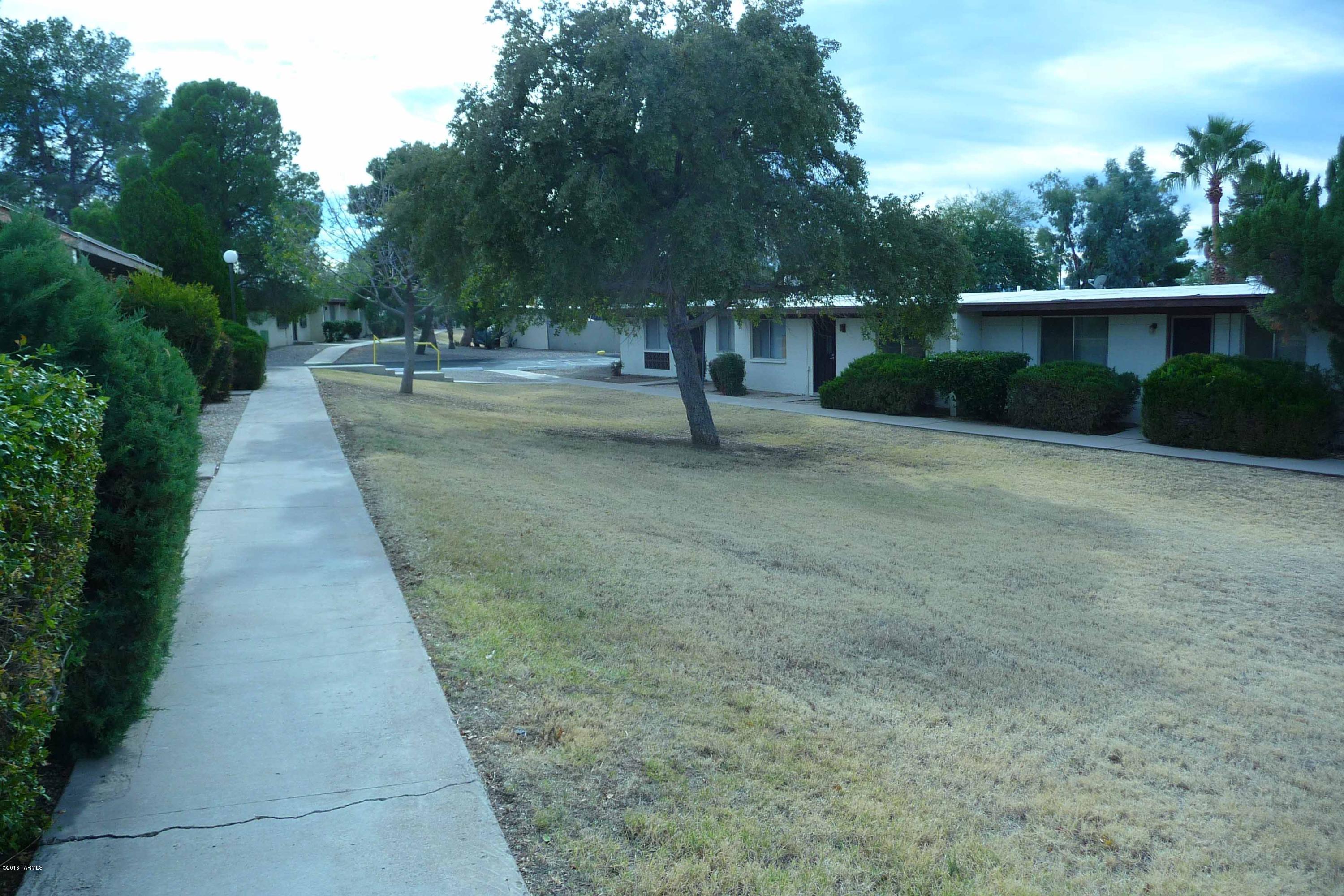 Cute 3 Bedroom 2 Bath Townhome in nice complex.  This unit has galley style kitchen, dining area, and family room.  Small back yard with outside laundry room.  1 covered parking space with plenty of parking close by.  Needs a little TLC.