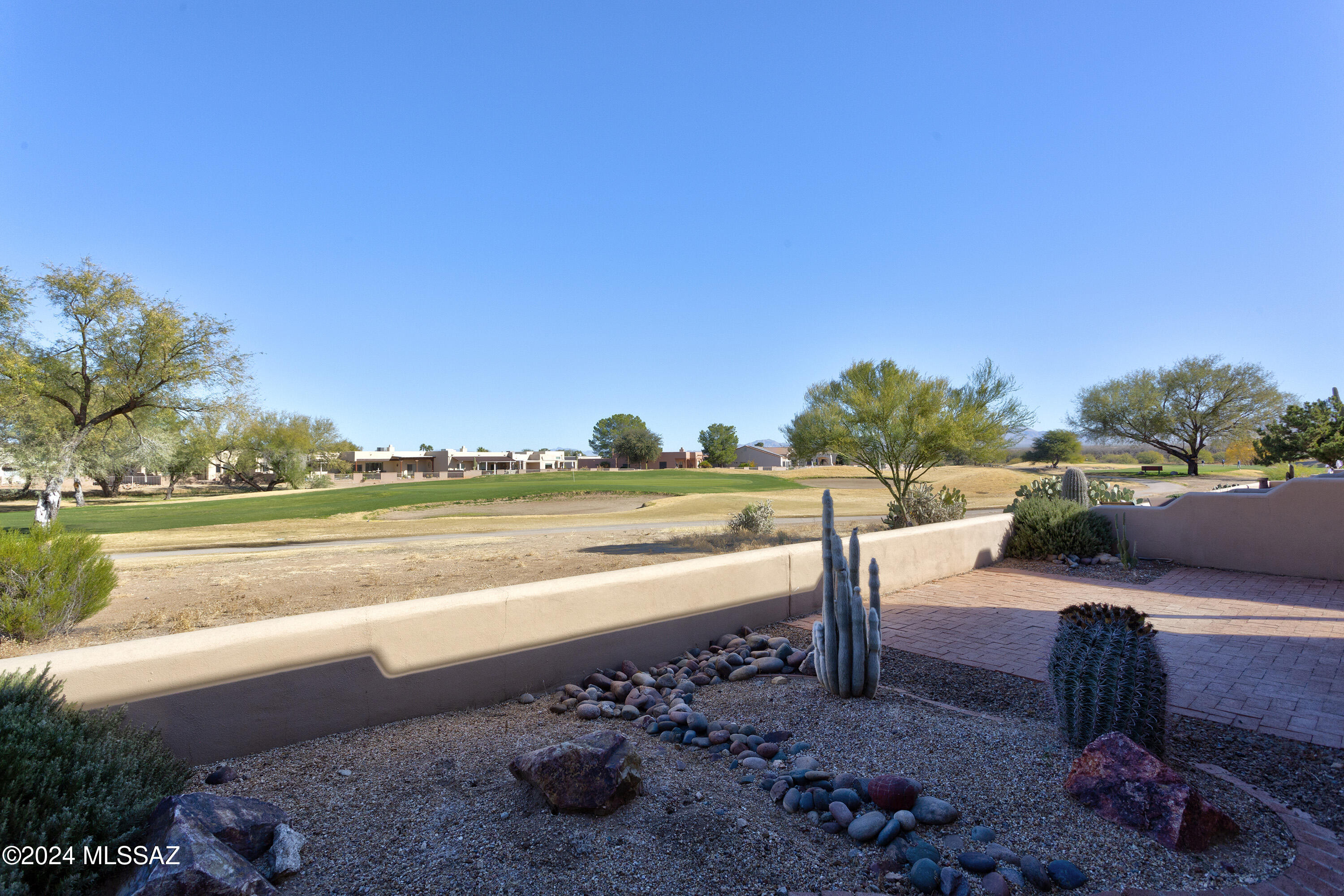 Nestled in the gated community of The Springs, this charming townhome offers stunning mountain views and is situated on the picturesque Torres Blancas Golf Course. This split floorplan home features 2 bedrooms, 2 baths, and a versatile den. As you step inside, you'll be greeted by high ceilings, private high windows, and skylights that flood the open-concept space with natural light.
The kitchen, equipped with new stainless-steel appliances and a new sink, overlooks the dining and living areas, creating a seamless flow for entertaining. The living areas boast tile floors, while the bedrooms and den are adorned with new carpet.
Step out back to the serene patio and take in the tranquil views of the golf course and mountains. The two-car garage offers ample storage space and includes a a utility sink.
This home also benefits from a Tesla solar lease, providing energy efficiency. The fantastic location includes access to a 1-mile walking trail and a Green Valley Recreation (GVR) center, complete with a pool, fitness center, fitness studio, and art, computer, clay, and photography studios.