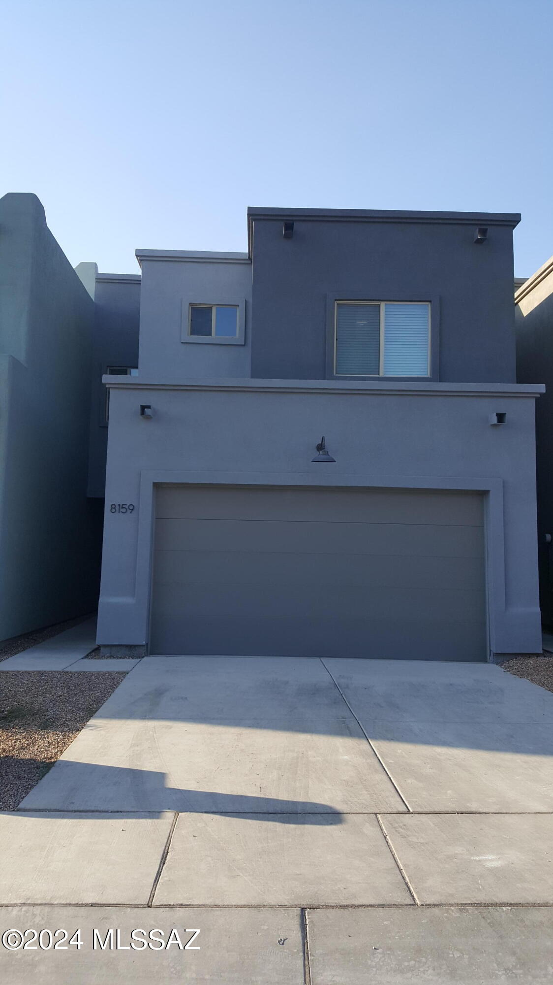 Beautiful Home, Barely 4 years Old Many, many Custom-Home touches by Builder. Gorgeous 3 Bdrm-2 1/2 Bath layout with a bathroom adjacent to every bedroom and 1/2 Bath on ground level. Has upstairs Kitchenette with Microwave, Sink & Fridge in the large Laundry Room. Has Zoned Heating & Cooling, which utilizes Dual Thermostats (Upstairs & Downstairs) with a Damper That directs the HVAC Air to match the thermostat settings. Upgraded Appliances throughout, Front & Rear RING Security System with Motion Detectors inside. Enclosed rear yard with 6.5' high Steel Walls. Upgraded Hardware on Cabinets & Doors. 8 Ft. Garage Door height fits taller vehicles with ease. Gorgeous home you must see to appreciate!  Also has dedicated 220V outlet in garage for Electric Car Charger!