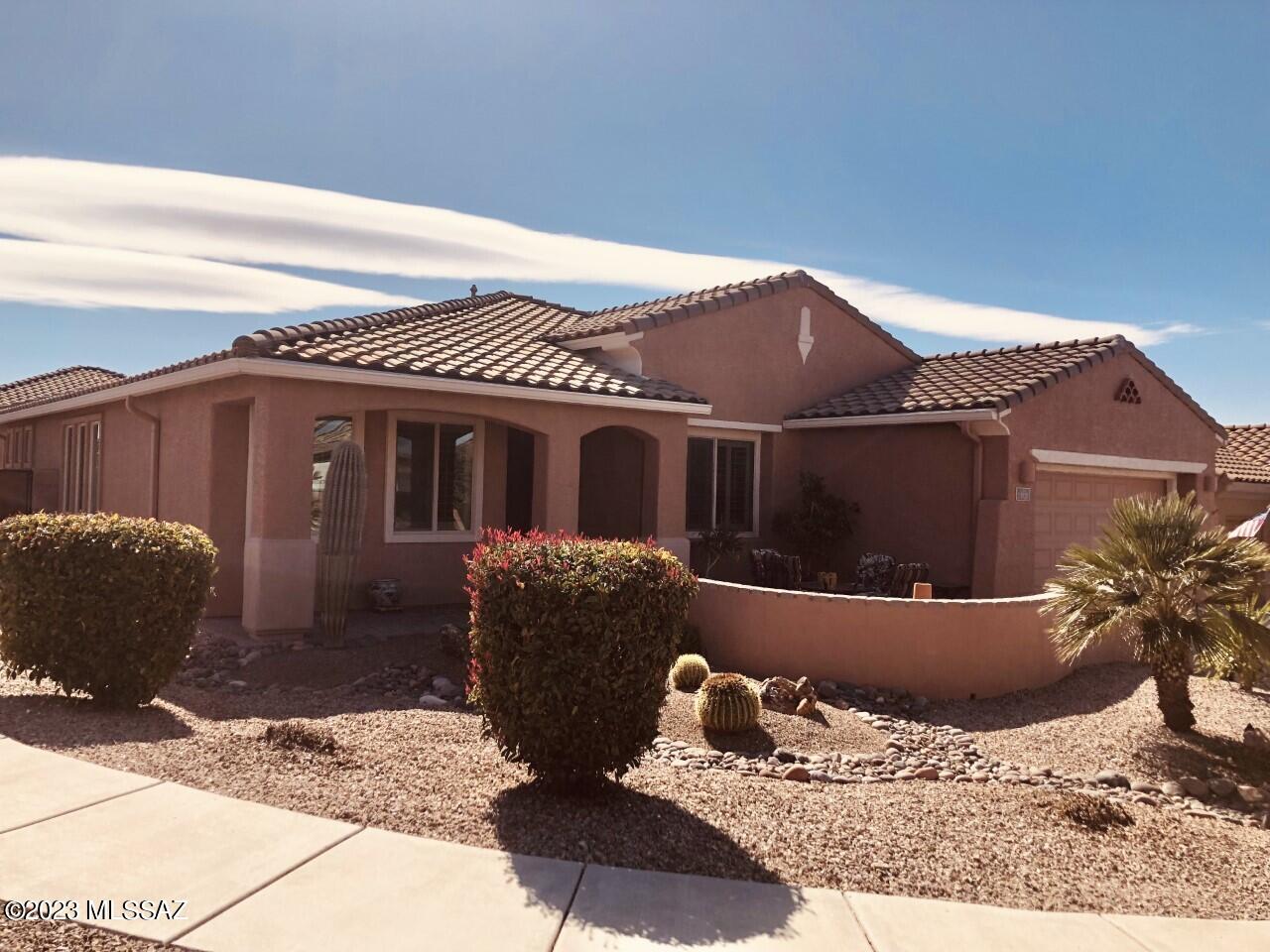 Wonderful 3BR/2.5BA in 55+ Del Webb Community on Corner lot w/$100k+ of improvements,This Solar powered home has everything you need to enjoy our great weather.Front Courtyard to relax w/your morning coffee/evening beverage.If you're looking for privacty,the back patio is an extension of living area.Travertine Pavers,Elevated area w/view of Rincon Peak.Roll down shades in all directions,Built-in BBQ.Stereo Suround.Perfect for entertaining family & friends.Newly painted interior w/upgrades everwhere.Laminate Wood & Tile.No carpet.Gourmet kitchen pkg. w/granite & maple sable cabs w/pullouts,soft close drawers.Bay Window at Nook.Murphy bed guest BR. makes for multi use area.Plantation shutters.Stereo Suround System.Extended Garage w/storage racks.Storage shed. Facilities here are Fantastic !!
