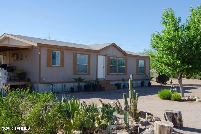 Cozy 3BD, 2BA Home on over 4 Acres of land. Clean, open landscaping with lots of space. This property is move in ready.