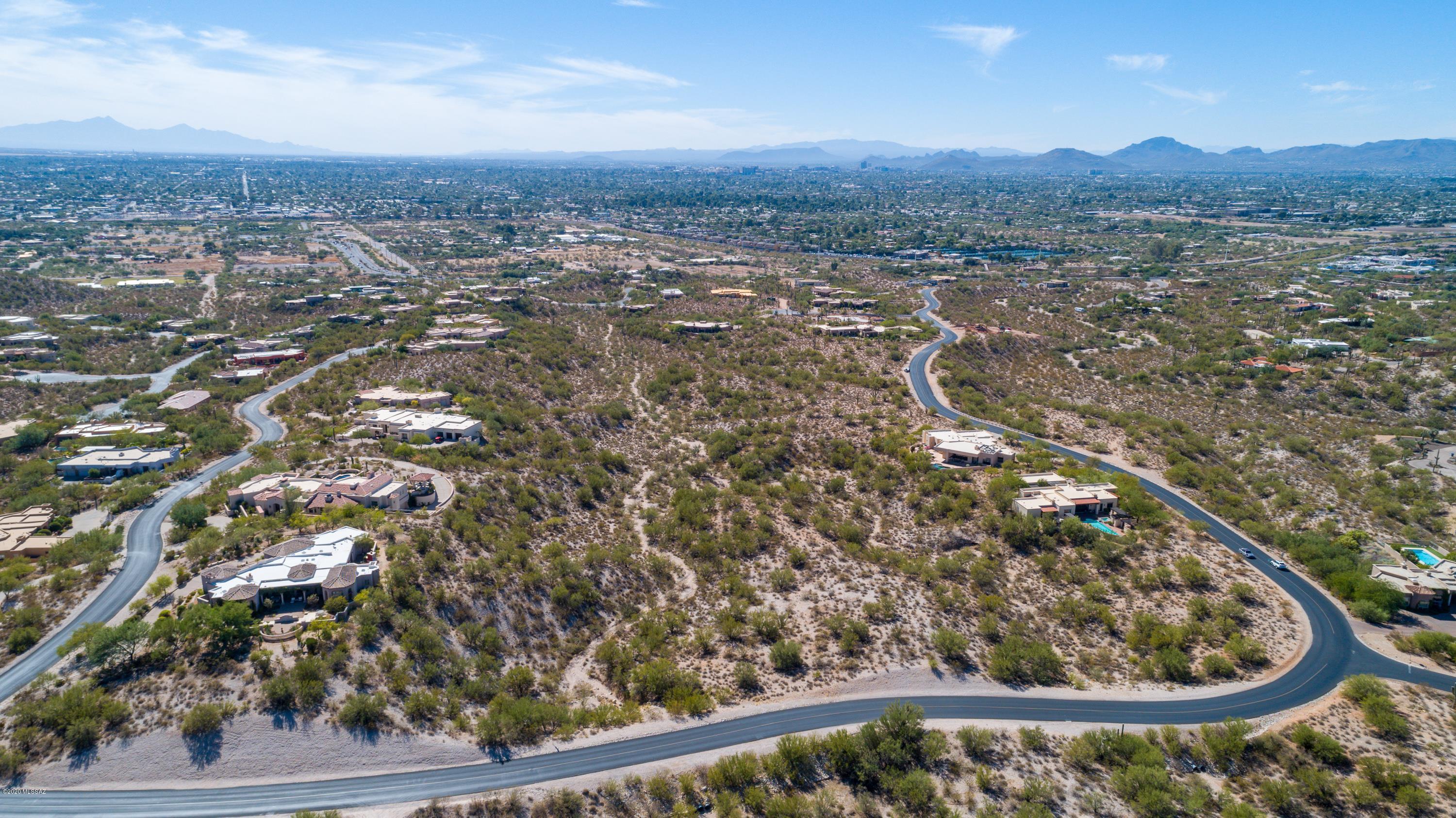 Stunning property with Everything you would want in a custom home site...city and mountain views, gentle building site, surrounding homes in place so view lines are easily understood.

UNDER THE ''PHOTO'' TAB, CLICK  FOR AERIAL VIDEO AND AERIAL PHOTOS.