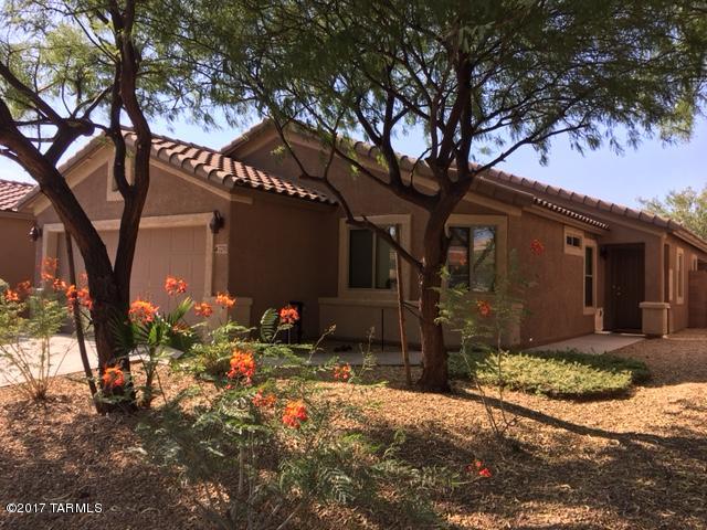 This looks like a model home with 4 bdrms., 2 baths or 3 bdrms. + a den. Spacious great room and opened kitchen with upgraded cabinets, granite counter tops, and stainless steel appliances. Ceramic tile in all the main areas with carpeting in 3 bdrms. Washer & dryer included, 2 car garage, and large easy care back yard. NO PETS ALLOWED!