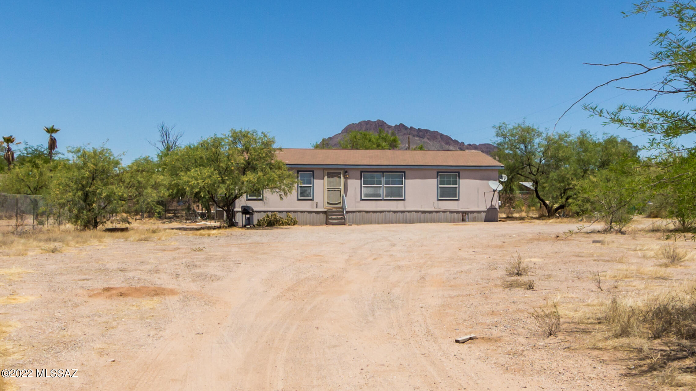 Come and check out this 3 bedroom 2 bath (Split bedroom floor-plan) home on an acre lot!  If you are looking for a little space and NO HOA; then this home may be for you.  This home offers many upgrades such as vaulted ceilings, center island in the kitchen, multiple bonus linen closets, ceiling fans, dual pane windows, and a large walk-in closet in the master.  All appliances are included; so come by and check out this spacious home.  You will love all the space for privacy, horses, etc.  Access to this home is mostly paved with a very short county maintained dirt portion.