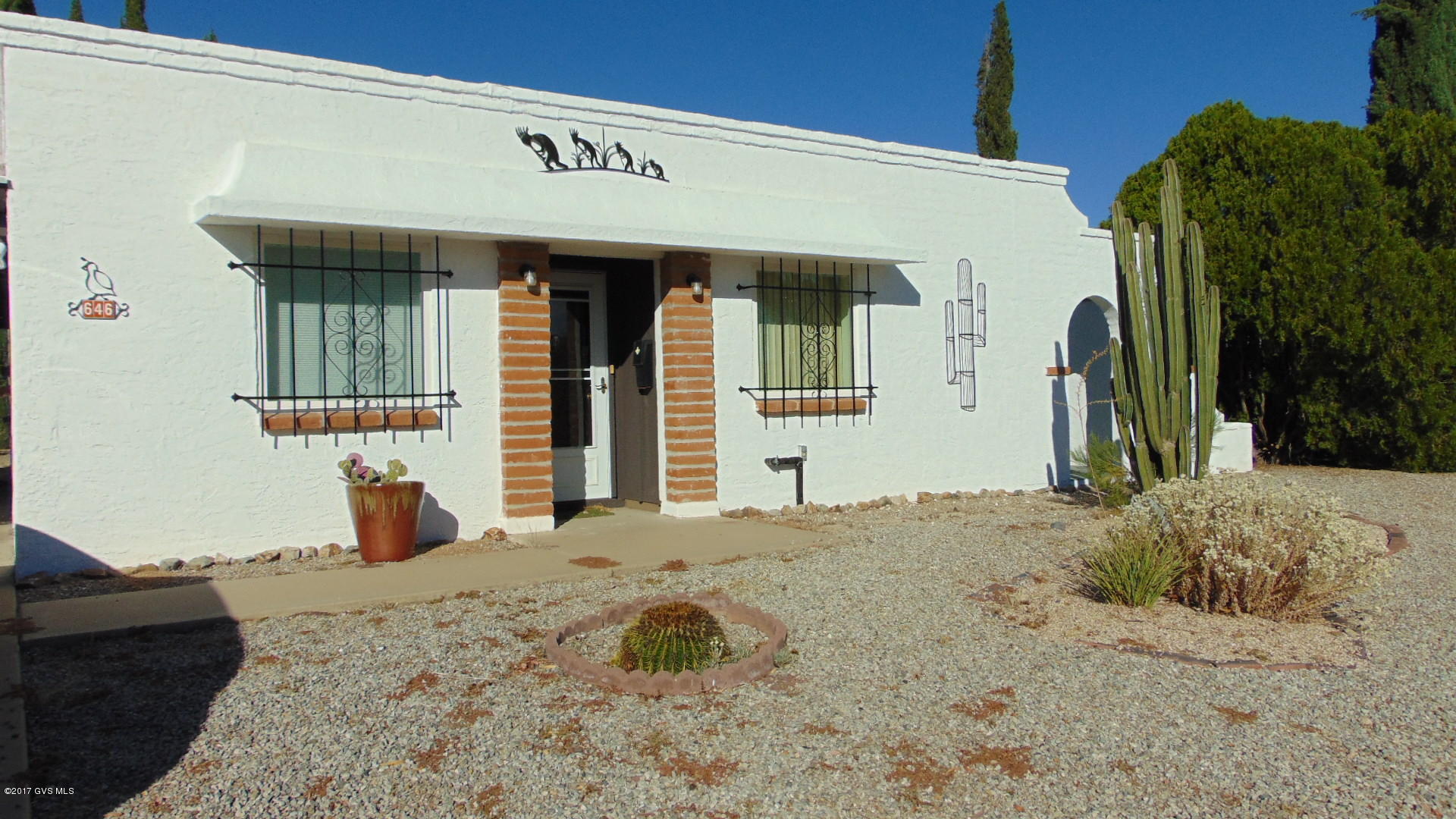 LOVELY WELL MAINTAINED HOME WITH MOUNTAIN VIEW FROM FRONT, 3 BEDROOM 3RD BEDROOM HAS DOUBLE DOORS FROM LIVING ROOM SO WOULD MAKE A LOVELY DEN OR OFFICE, FULLY FURNISHED, NEWER FURNACE, AC & WATER HEATER, TILED COUNTERS IN KITCHEN