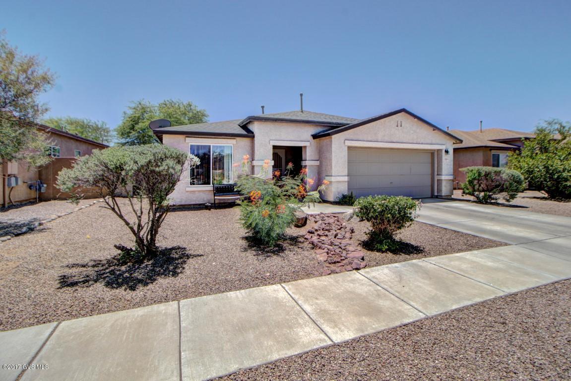 Lovely, well maintained, 3BR, 2BA, single family home - split plan with great room open to family room and 
 formal living room entrance. Large kitchen with breakfast bar, gas stove, stainless steel double door refrigerator and lots of counter space and cupboards. Washer and dryer in laundry room. Nicely decorative custom security doors front and back. Covered porch with ceiling fans, extends the length of home. Freshly painted inside. Lots of storage with huge linen closets in bathrooms. Backs up to common area. Conveniently located near I-10 & Craycroft.