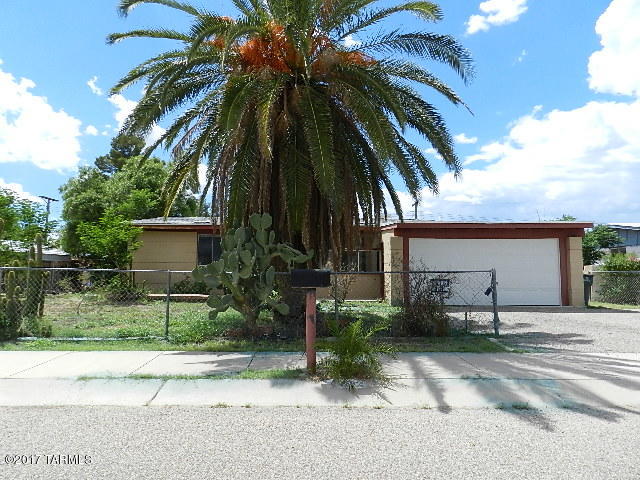 Price Reduced!! Great opportunity to own this 4 bedroom/2 bath home in Central location. Chain link fence in front yard with mature palm tree. Great sized lot with block wall and storage shed in rear. Attached 2 car garage.