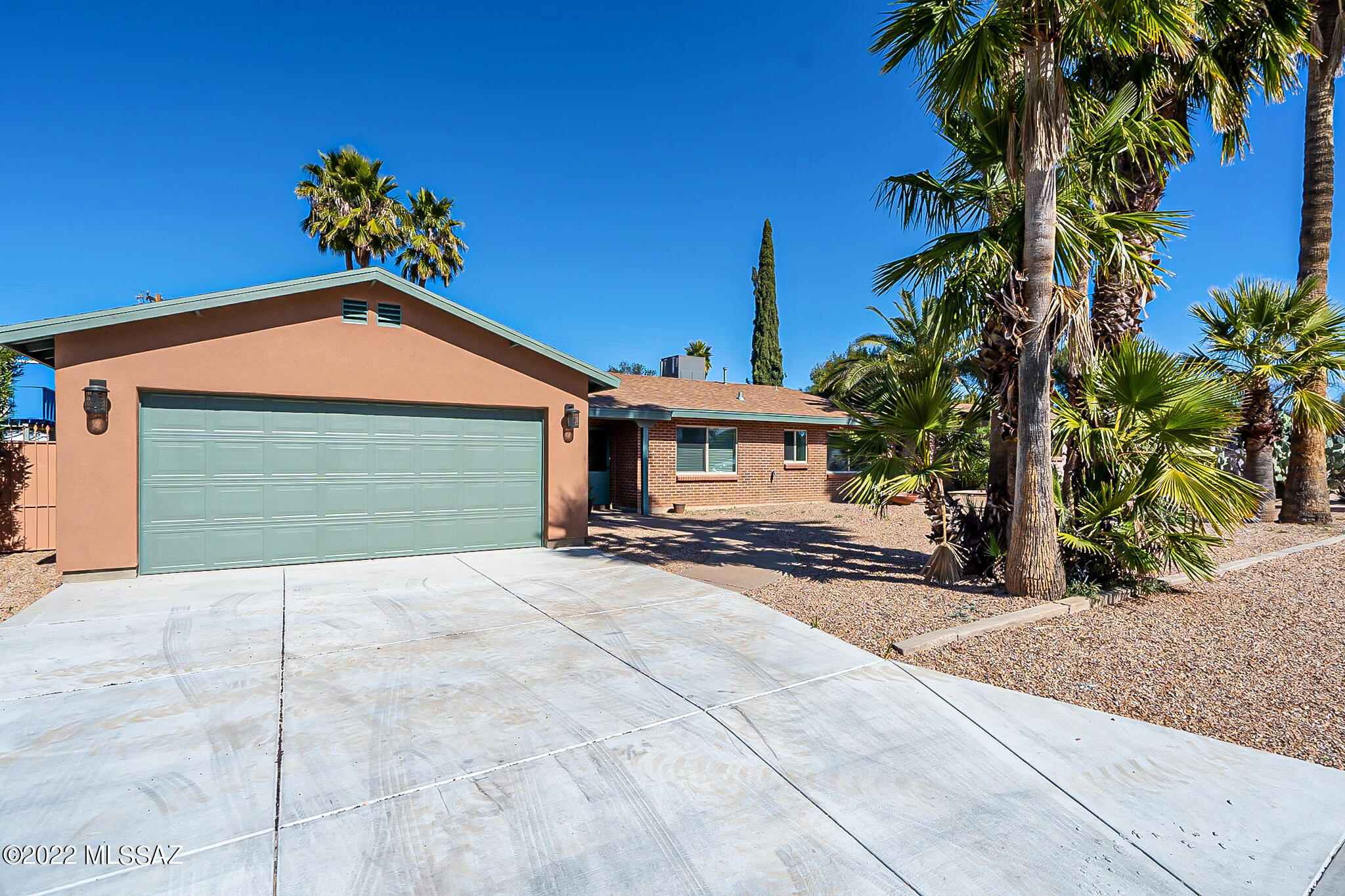 Located in the Highly Desirable neighborhood of Encanto Park, this Stunning 4bd/3bath home has 2038 sqft of living space, with upgrades throughout; including a brand new remodeled kitchen with granite countertops, closet pantry, SS electric appliances, and kitchen peninsula, leading into dining area; gorgeous porcelain flooring, new windows and window coverings, new plumbing and electric, new AC and water heater, ceiling fans, 3 fully remodeled bathrooms, a newly added attached double enclosed garage, a laundry room and a new shingled roof. Step outside and enjoy the spacious backyard with covered patio, brick pavers and a detached original storage shed. This Central Tucson Gem won't last long! (Listing Agent is related to Sellers.)