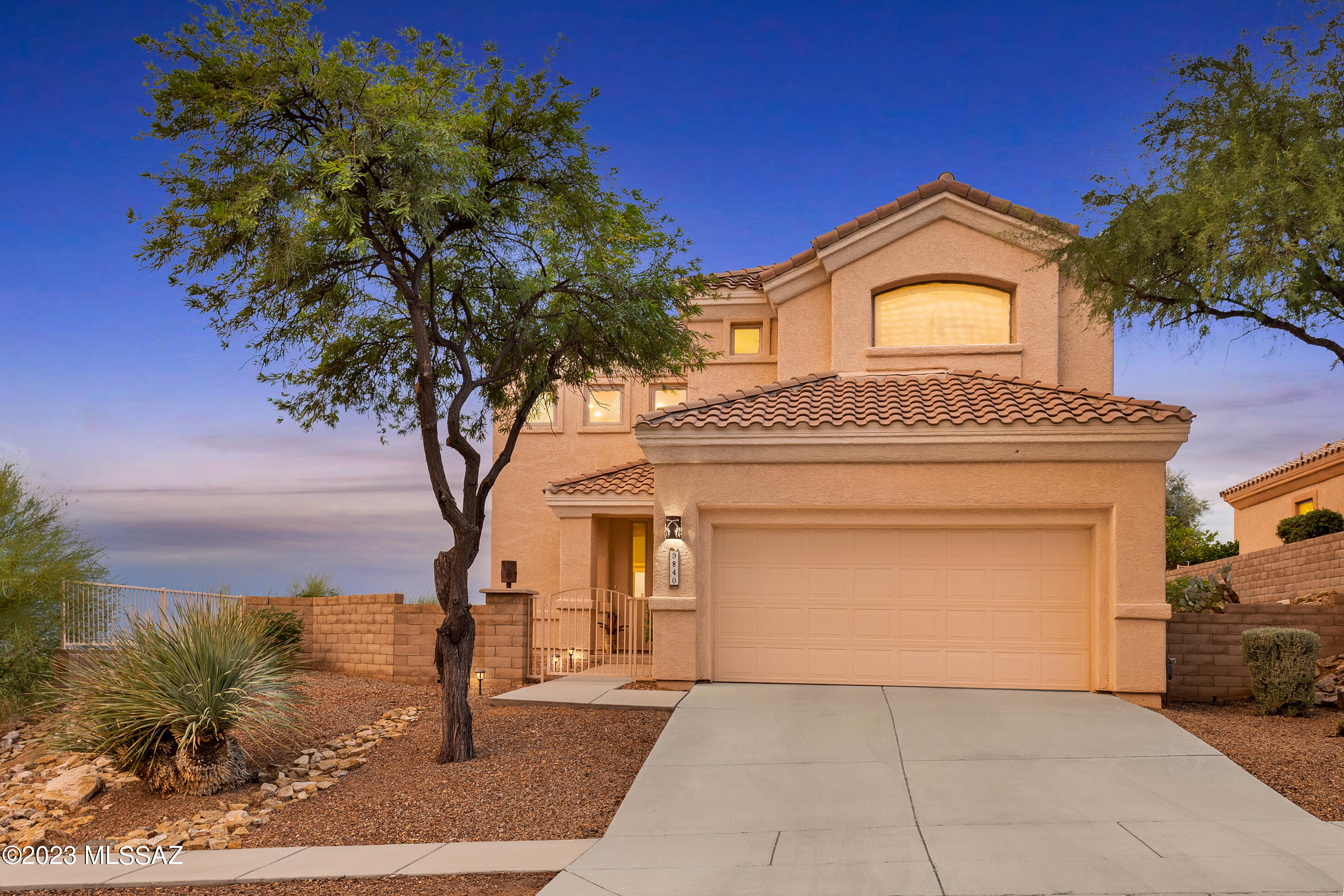 Million-dollar views from this high elevation, premium corner lot located in Sabino Springs, home of the renowned Arizona National golf course. From the back patio of this updated home, enjoy panoramic views of the city lights of the valley below and the surrounding mountains. The home is located on a very private 4-home cul-de-sac street at the top of the subdivision.  An impressive entry leads to the great room with formal dining area which has several large picture windows that provide magnificent views. This move-in-ready home features travertine flooring and a dual sided gas fireplace. Renovated kitchen with contemporary design has custom cabinets granite counters, stainless steel appliances, new custom tile backsplash, pantry, and a center island with a breakfast bar. The kitchen .. opens up to the family room featuring a beautiful gas fireplace. This is the ultimate lock & leave residence w/ low-care yard spaces. One bedroom and full bath downstairs and an en-suite guest room and the primary suite upstairs. Primary suite w/ big walk-in closet, a private deck and a luxurious, spa-like bathroom features marble quartz counters, dual-sink vanity, floor-to-ceiling tile surround shower w/ upgraded fixtures & travertine floors. 2- car garage, water softener, and NEW HVAC system.  Other recent additions include a new sun shade and updated landscaping.
The gated community of Sabino Spring offers you access to the pool, spa, workout facilities, and the Grill at Arizona National. This beautiful subdivision is located in the Tanque Verde Valley near the base of Mt. Lemmon.  Shopping and several restaurants are located within 5 miles.   


Arizona National Golf Course
Arizona National Golf Club offers desert golf at its finest. Designed by Robert Trent Jones Jr. in 1996 and voted Best Public Golf Course in Tucson, Arizona National Golf Club is nestled in the foothills of the beautiful Santa Catalina Mountains and abutting the Coronado National Forest. It follows the rugged natural flow of the land across shady mesquite-lined arroyos and skirts craggy rock outcroppings.