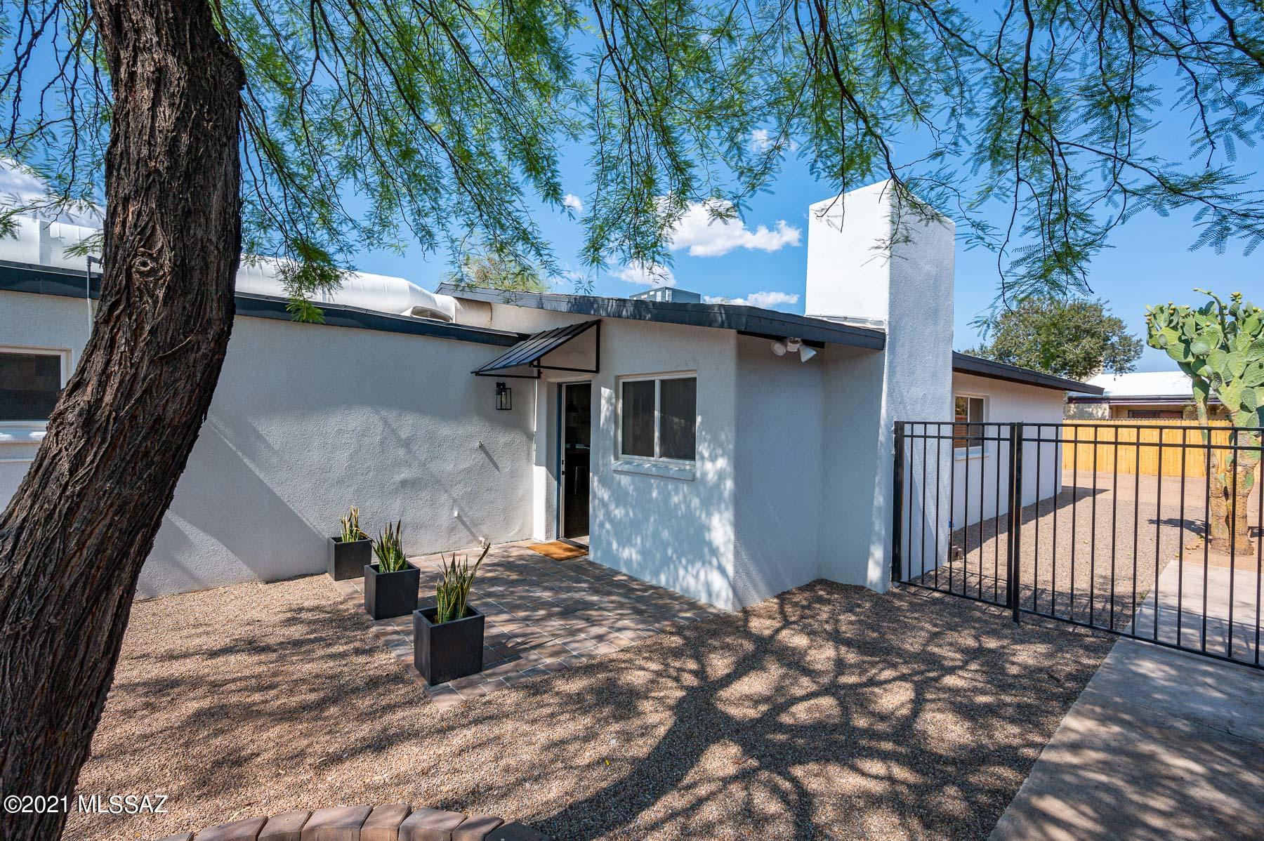 Buyer will accept offer btw price range 375,000 to 399,900, modern and spacious three-bedroom, two-bathroom, remodeled home in a great central neighborhood! Over 2,000 square feet, close to hospitals, shopping centers, and many other amenities. Complete with an open kitchen with a hand crafted butcher block island, stainless steel appliances, granite countertops, fireplace, office space, laundry room, and a large backyard. The master bedroom is spacious with room for exercise equipment and a walk-in closet! Brand new A/C unit, new kitchen appliances, and a Tucson Electric Power solar lease! No HOA. Don't miss your chance on this beautifully renovated property.