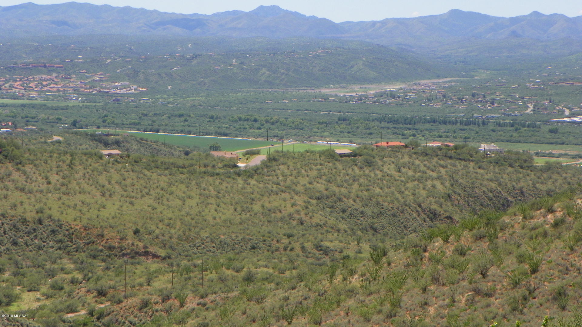 Fantastic views from the lot high up at in the foothills of San Cayetano mountain.  Lot is mostly all flat and usable too!  Road has just been chip sealed for easy access and location is just up the hill from the Palo Parado Bridge road to I-19.  Great spot for that dream home!