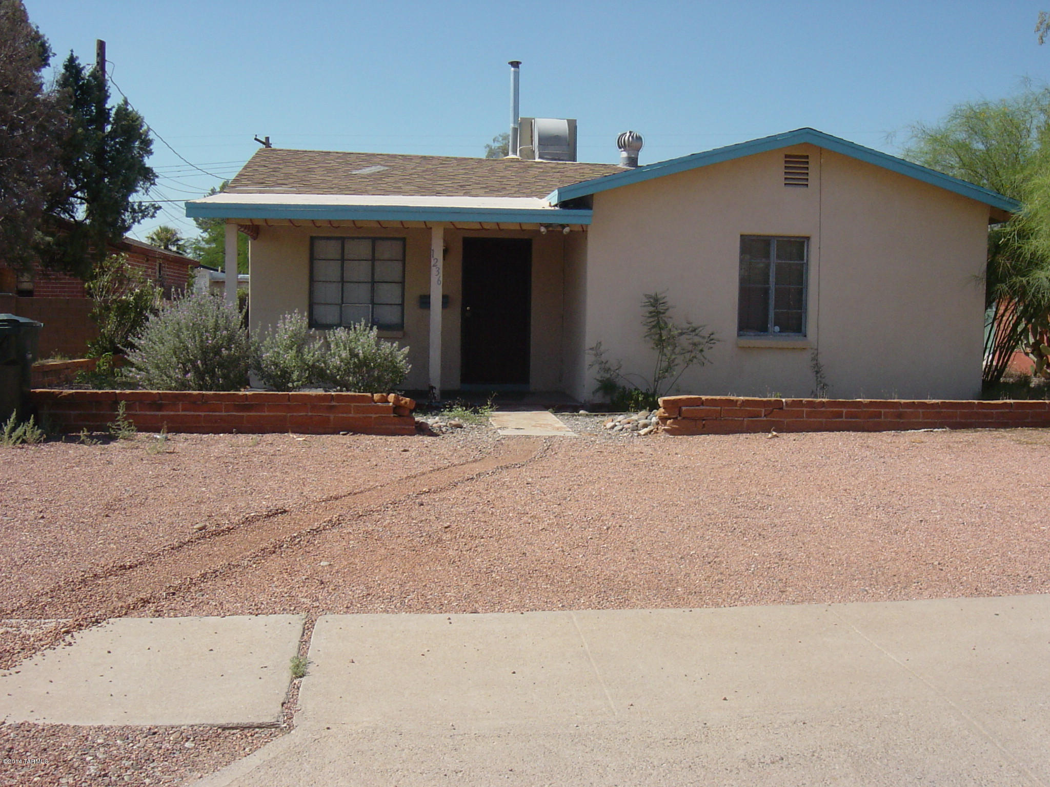 Large home centrally located near UofA and UMC.  This house could be a 4 Bedroom with a Den or a 5 Bedroom Home depending on what you need, 3 Bathrooms, A/C, 3-Covered Parking Spaces, Storage Shed and a nice Yard.