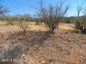 Nice residential lot with mountain views, gentle slope, paved road, electric and water at the street.
