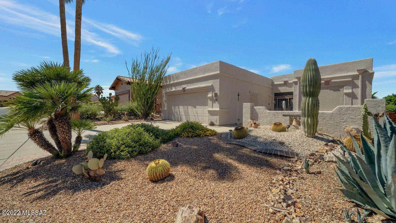 Beautifully maintained 2BR 2BA home in the Las Campanas community. Enjoy high ceilings; bright neutral colors; Plantation shutters in an open floorplan with wide hallways and tile floors. In addition to the living areas, there is an Arizona room with separate air conditioning, overlooking the lush garden with healthy landscape specimens and lots of colors. Inside, you will find an extra room which can be used as a small office or for storage. There are two patios on the property, each with brick pavers. In the front, there is a wonderful seating area to enjoy the views of the mountain tops from this delightful community. The Las Campanas rec center is just a short walking distance from this residence