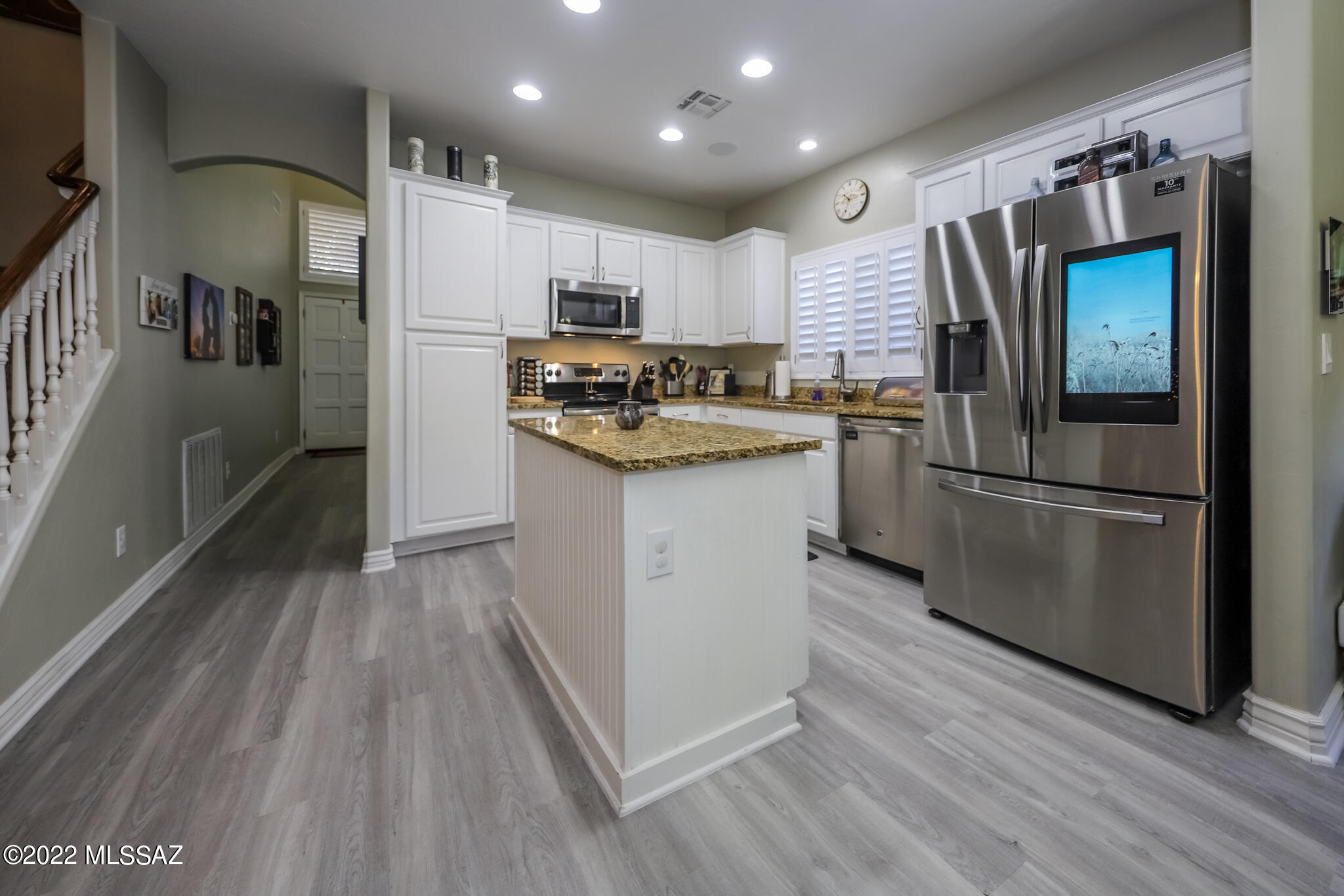 Great opportunity to move into the desirable Lakes At Castle Rock community! The home itself boasts a bright, open floorplan with high ceilings, granite countertops and stainless steel appliances. Gorgeous new flooring begins as soon as you open the door and truly compliments the walls, cabinets and accents. Large Master bedroom with updated master bath, including a beautiful walk in shower equipped with 2 rainfall showerheads and glass block. An inviting backyard with covered patio, artificial turf and a fire pit perfect for entertaining. This gated neighborhood has amenities galore. Featuring 14 lakes, 2 pools and spas, a fitness center, basketball and volleyball courts and more!