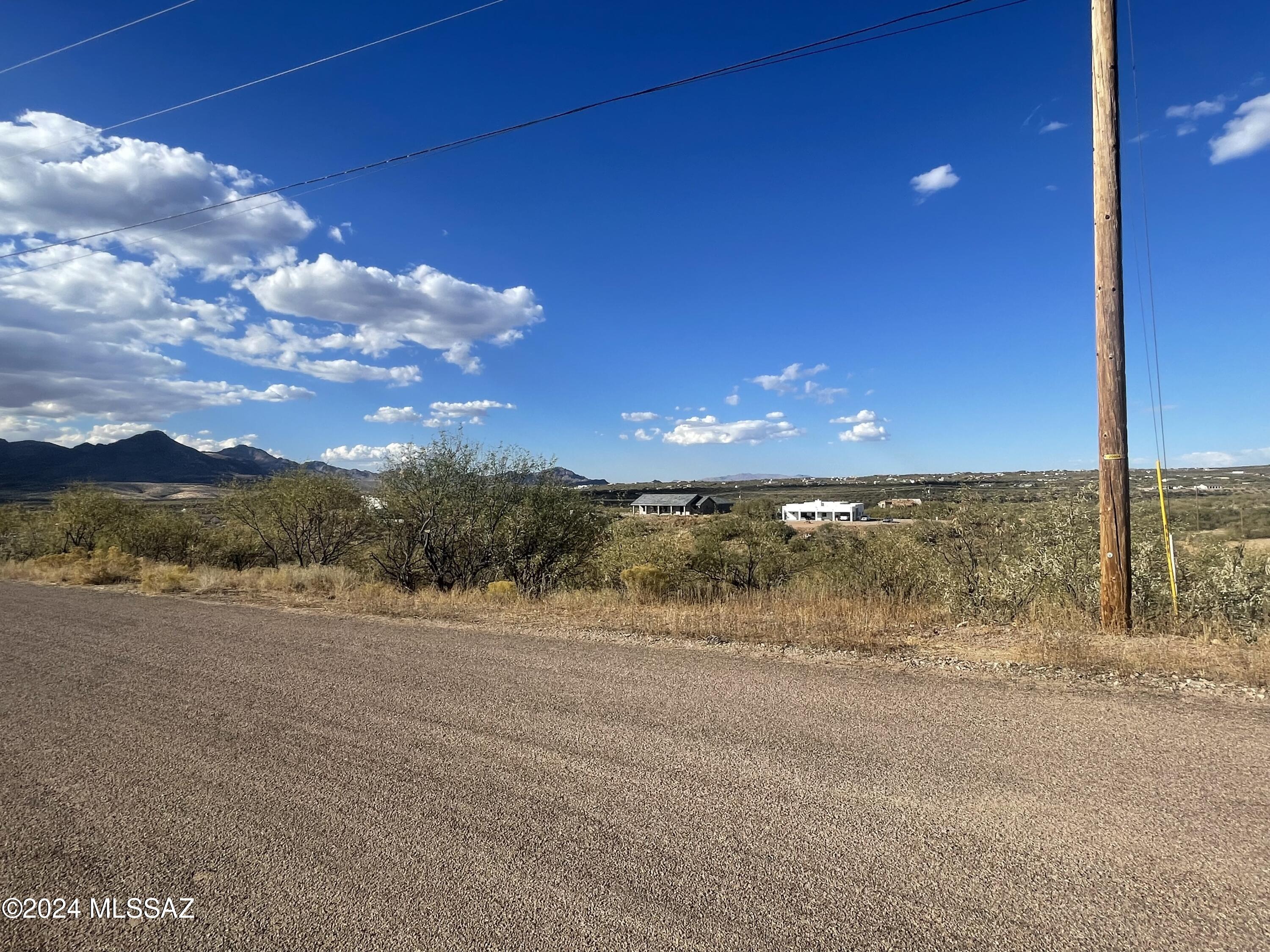Build your home on this serene desert surrounded by beautiful views of the nearby mountains.   The property is 1.48 acres of land on a paved street and electricity is nearby.   If you are looking for privacy and convenience to services, come and take a look at this lot.