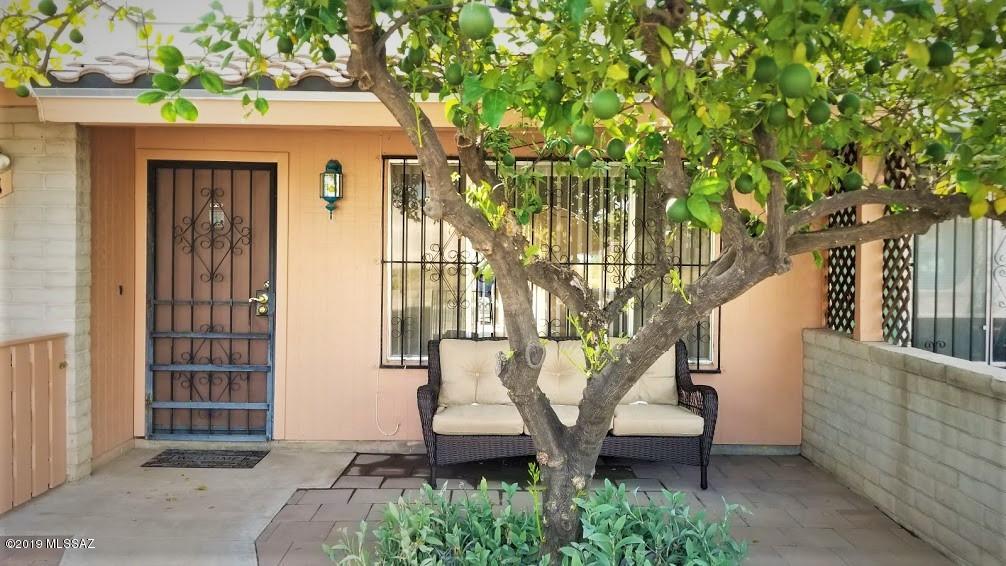 SEE NOW!!!  Beautifully updated Town Home in a most convenient location. Kitchen new & expanded.  Both baths updated, master with unique tile. New carpet, new luxury vinyl plank flooring. New AC (yay). No corner untouched and improved by the owner. Quiet West Side neighborhood 3 mins. to I 10, 7 mins to downtown, 13 mins to U of A. Bike paths, and new Trailheads going in 2 locations see doc's.  The sunsets are breath taking from here and you have peek a boo city lights view as well as fireworks. Don't miss this ''almost new'' easy to move right in home.